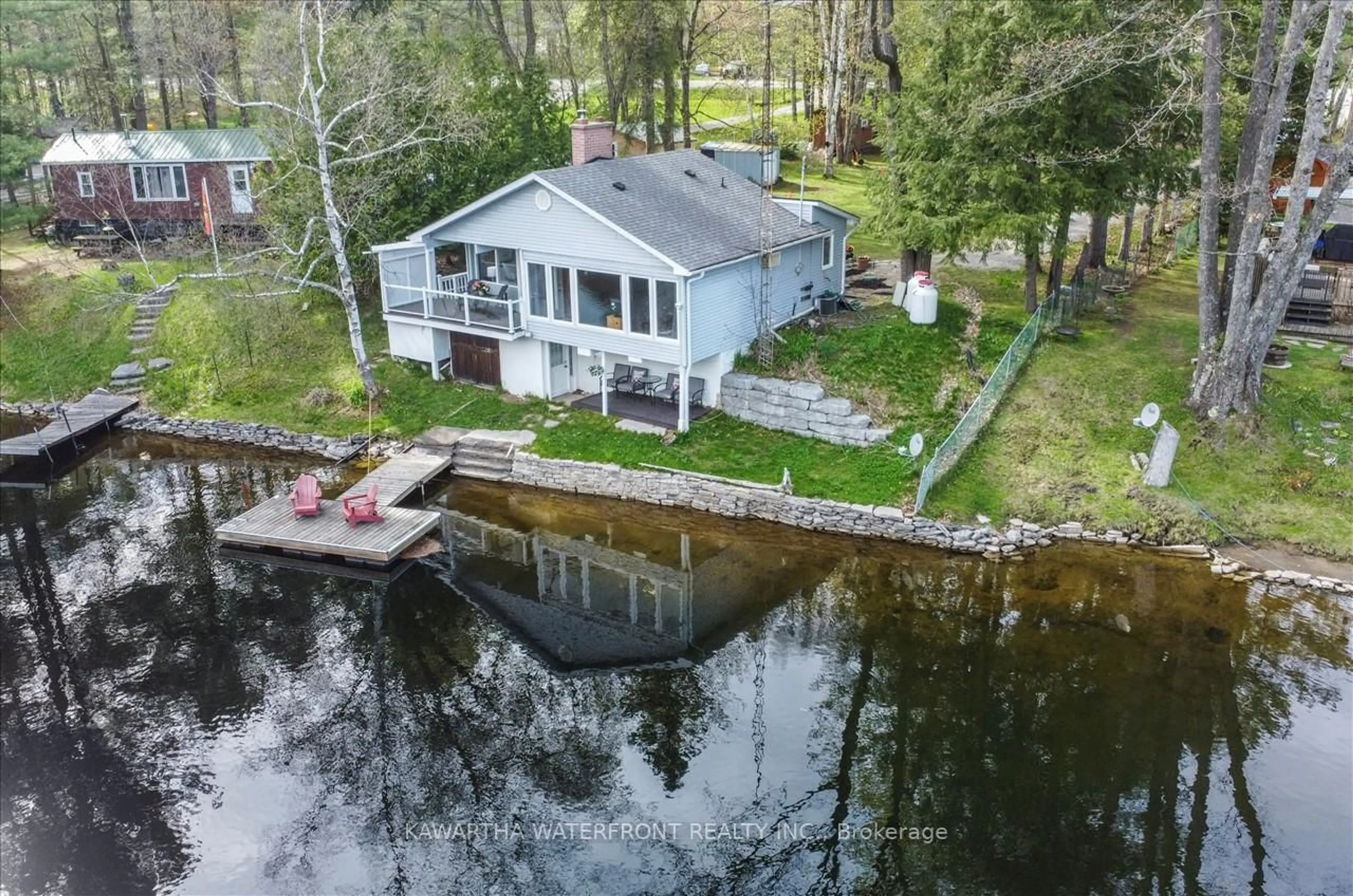 A pic from outside/outdoor area/front of a property/back of a property/a pic from drone, water/lake/river/ocean view for 3534 Monck Rd, Kawartha Lakes Ontario K0M 2L0