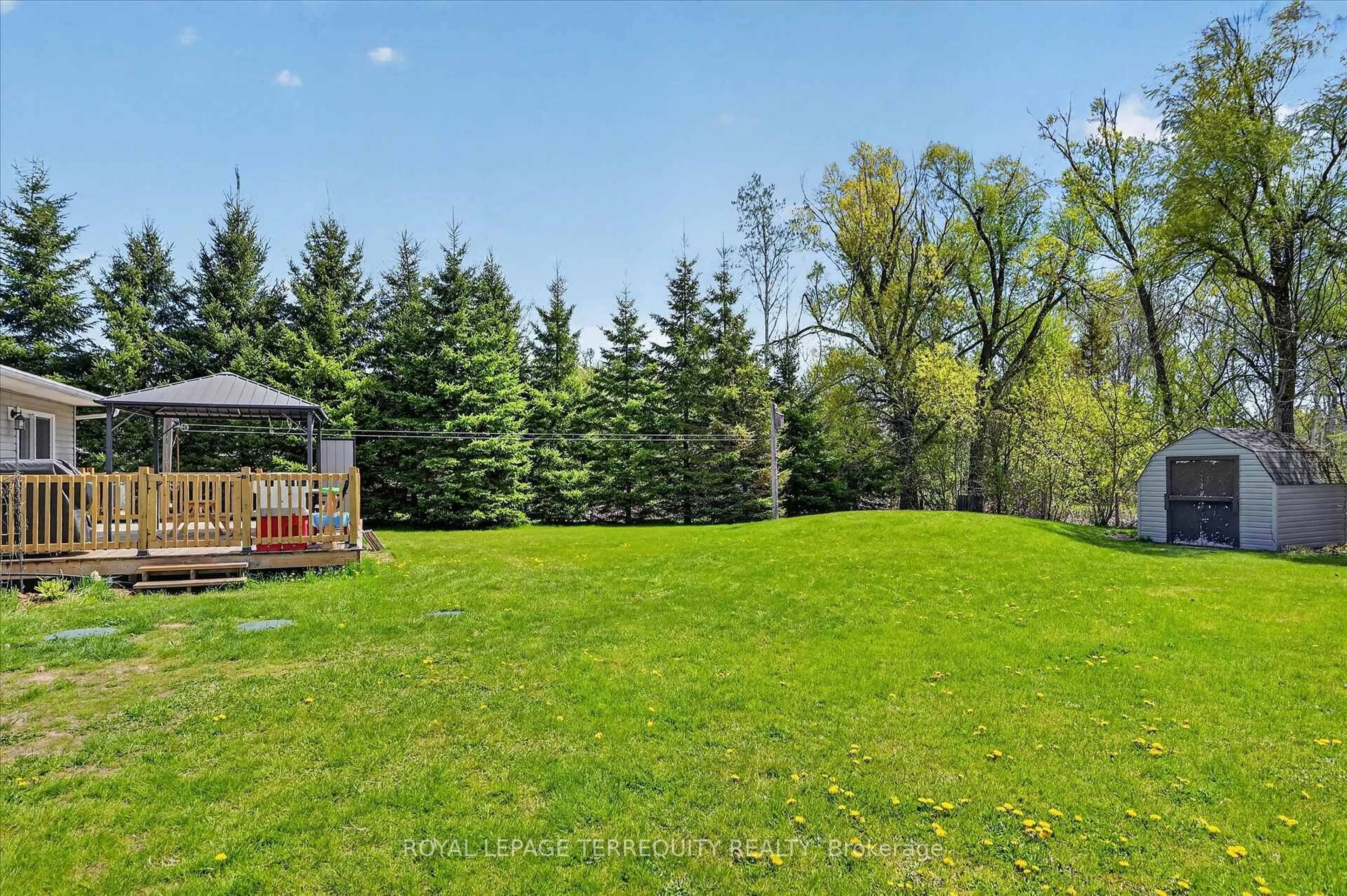 A pic from outside/outdoor area/front of a property/back of a property/a pic from drone, forest/trees view for 23 Whitfield Rd, Otonabee-South Monaghan Ontario K0L 1V0