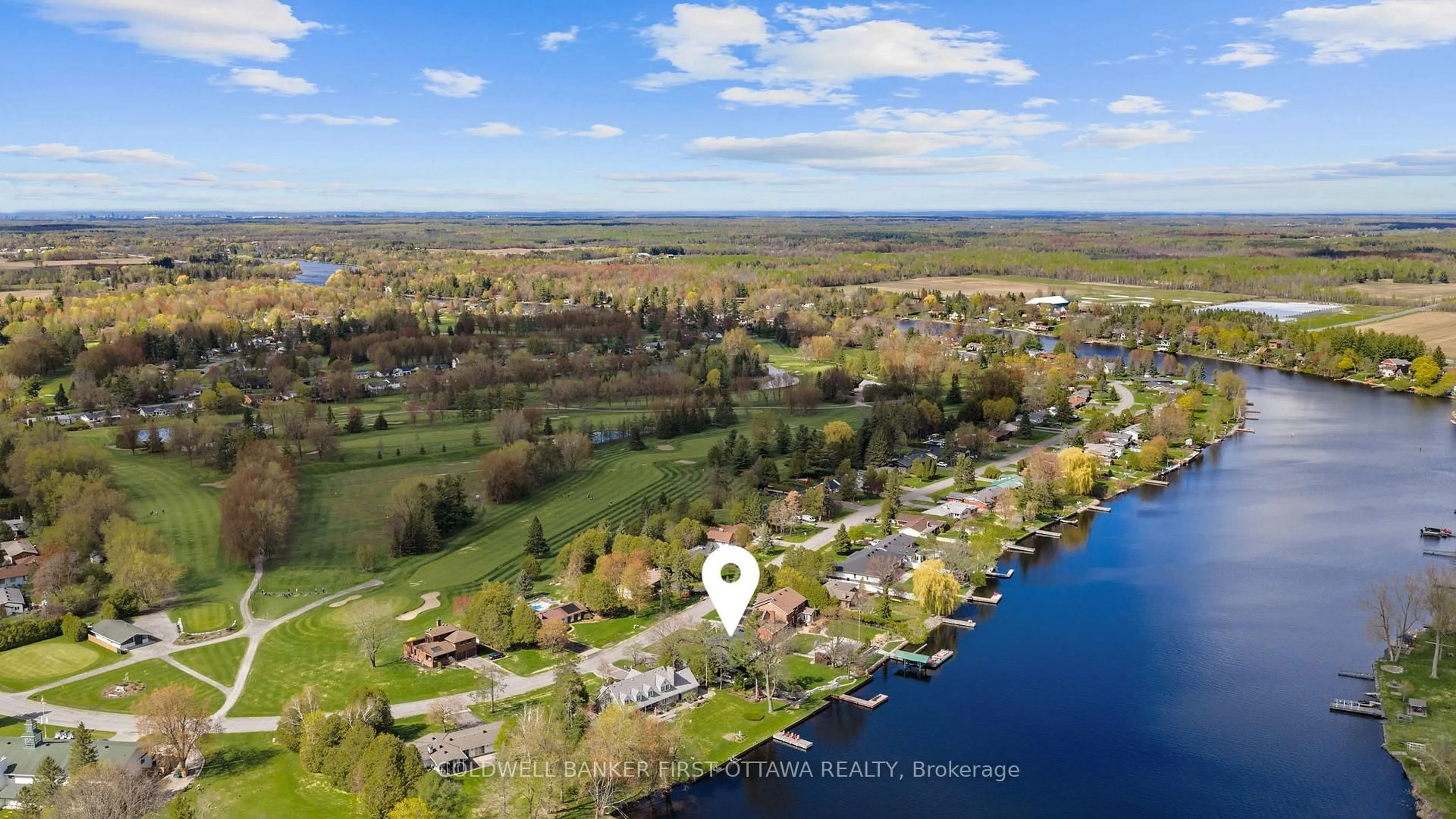 A pic from outside/outdoor area/front of a property/back of a property/a pic from drone, water/lake/river/ocean view for 6619 Marina Dr, Manotick Ontario K4M 1B3