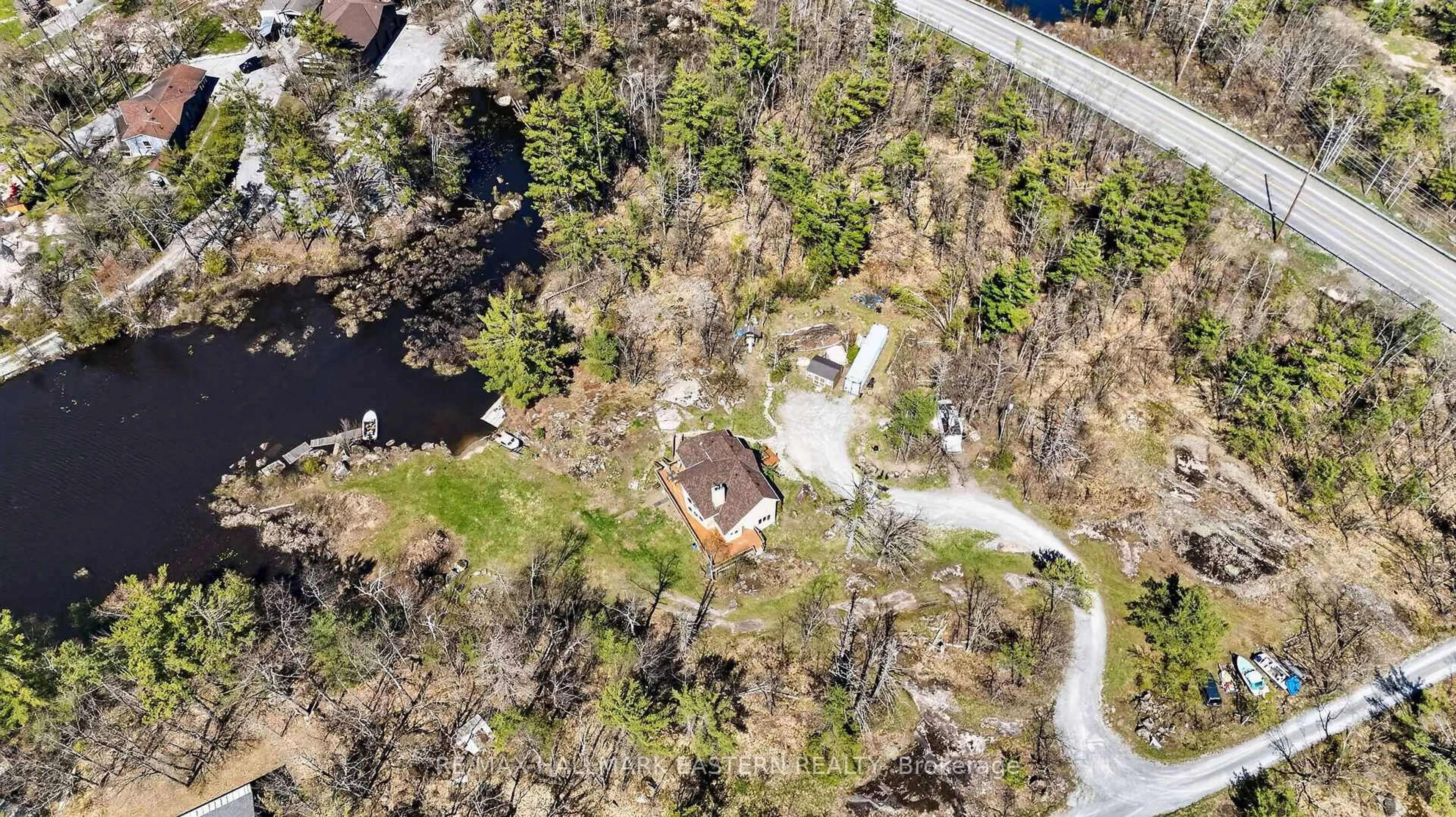 A pic from outside/outdoor area/front of a property/back of a property/a pic from drone, water/lake/river/ocean view for 1890 Morrow Lane, Douro-Dummer Ontario K0L 2H0