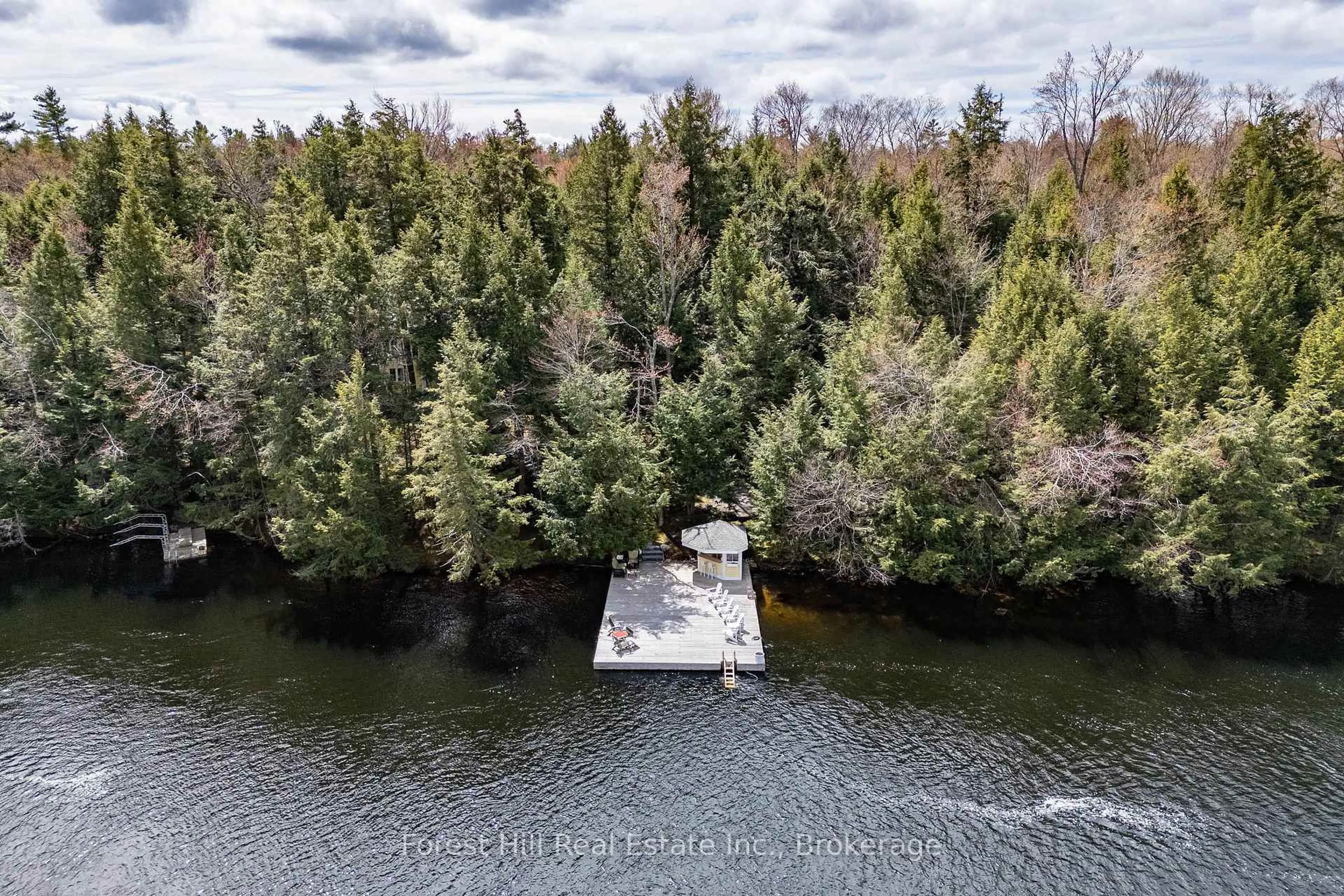 A pic from outside/outdoor area/front of a property/back of a property/a pic from drone, water/lake/river/ocean view for 13-1630 Muskoka District Road 38 Rd, Muskoka Lakes Ontario P0C 1A0