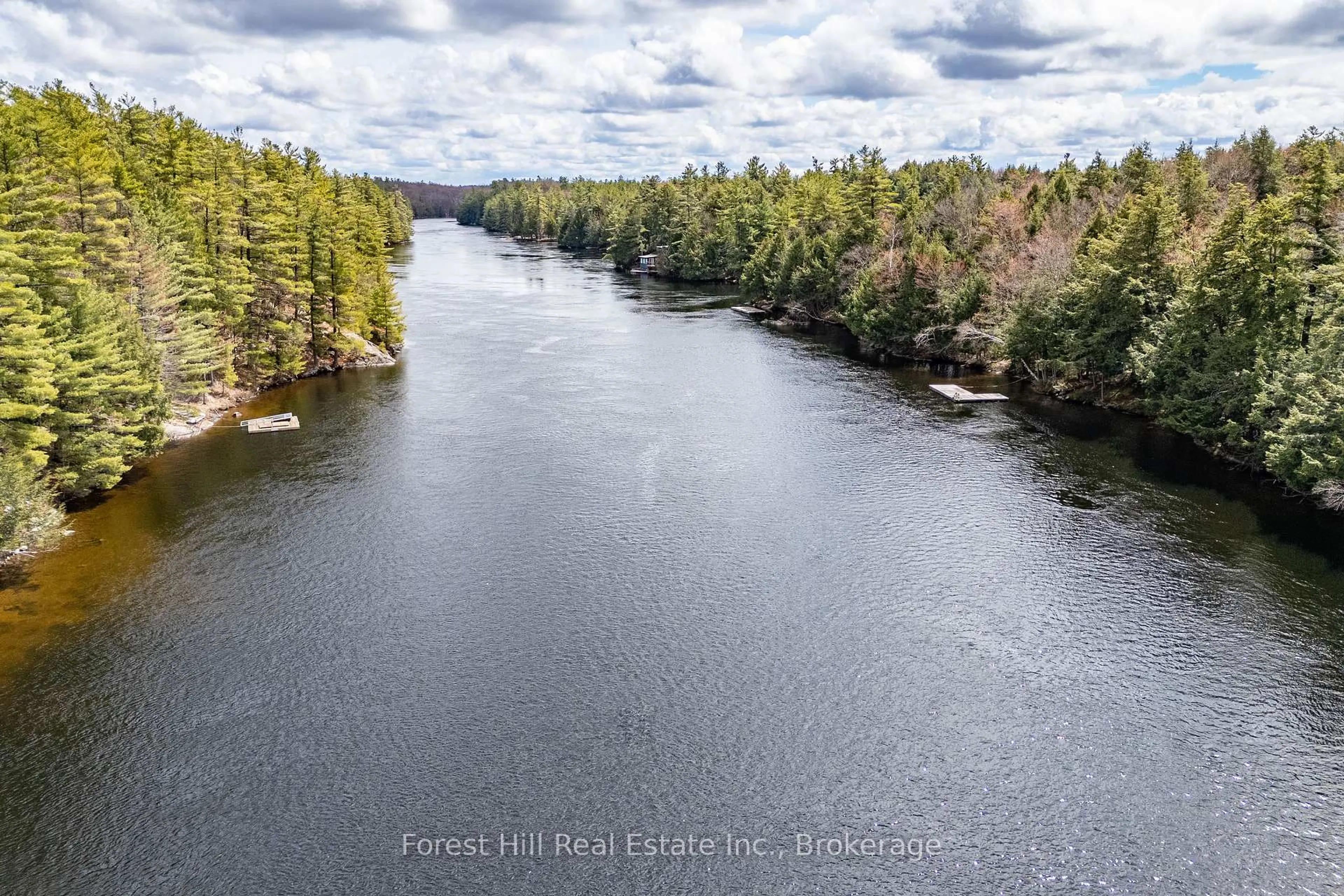 A pic from outside/outdoor area/front of a property/back of a property/a pic from drone, water/lake/river/ocean view for 13-1630 Muskoka District Road 38 Rd, Muskoka Lakes Ontario P0C 1A0