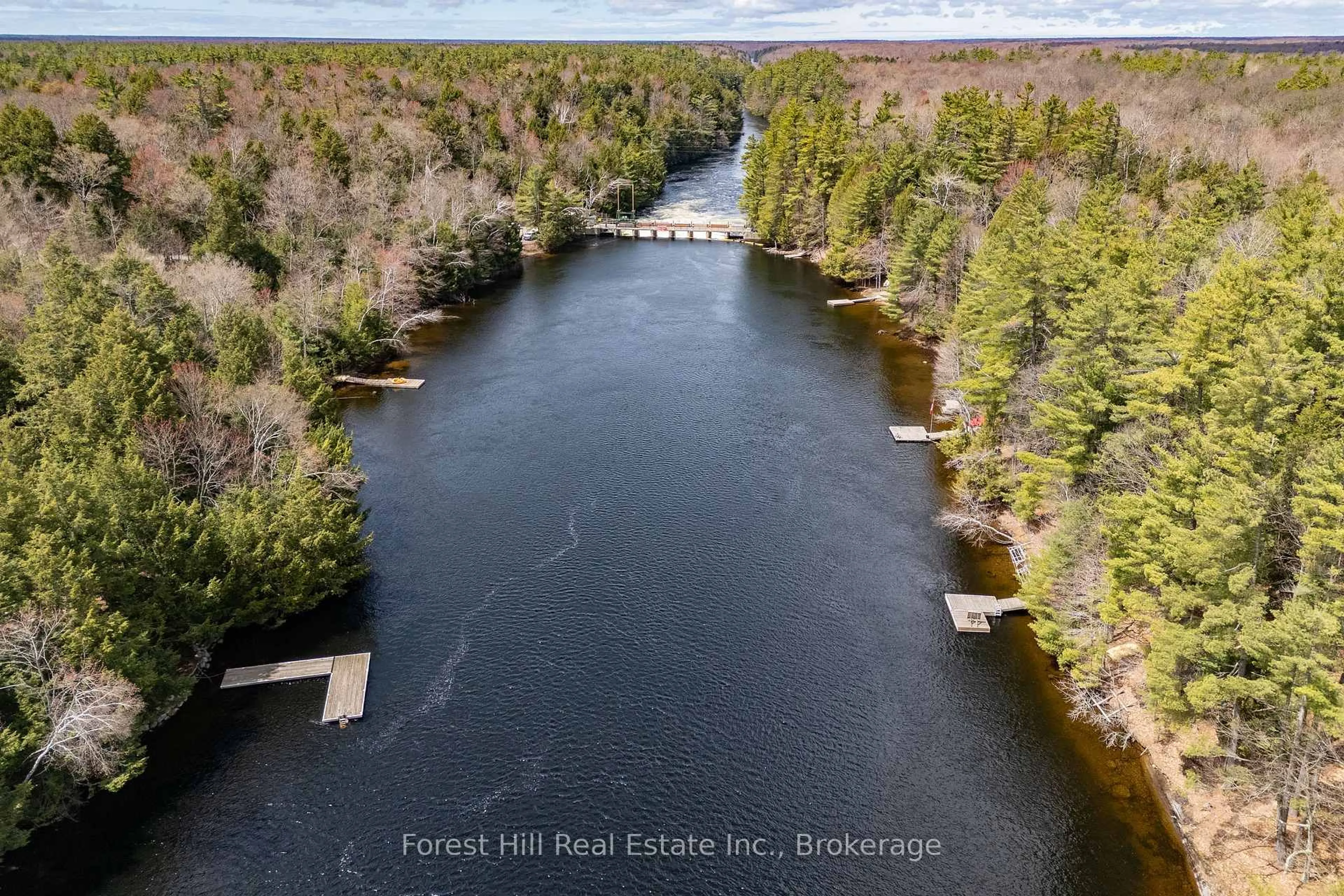 A pic from outside/outdoor area/front of a property/back of a property/a pic from drone, water/lake/river/ocean view for 13-1630 Muskoka District Road 38 Rd, Muskoka Lakes Ontario P0C 1A0