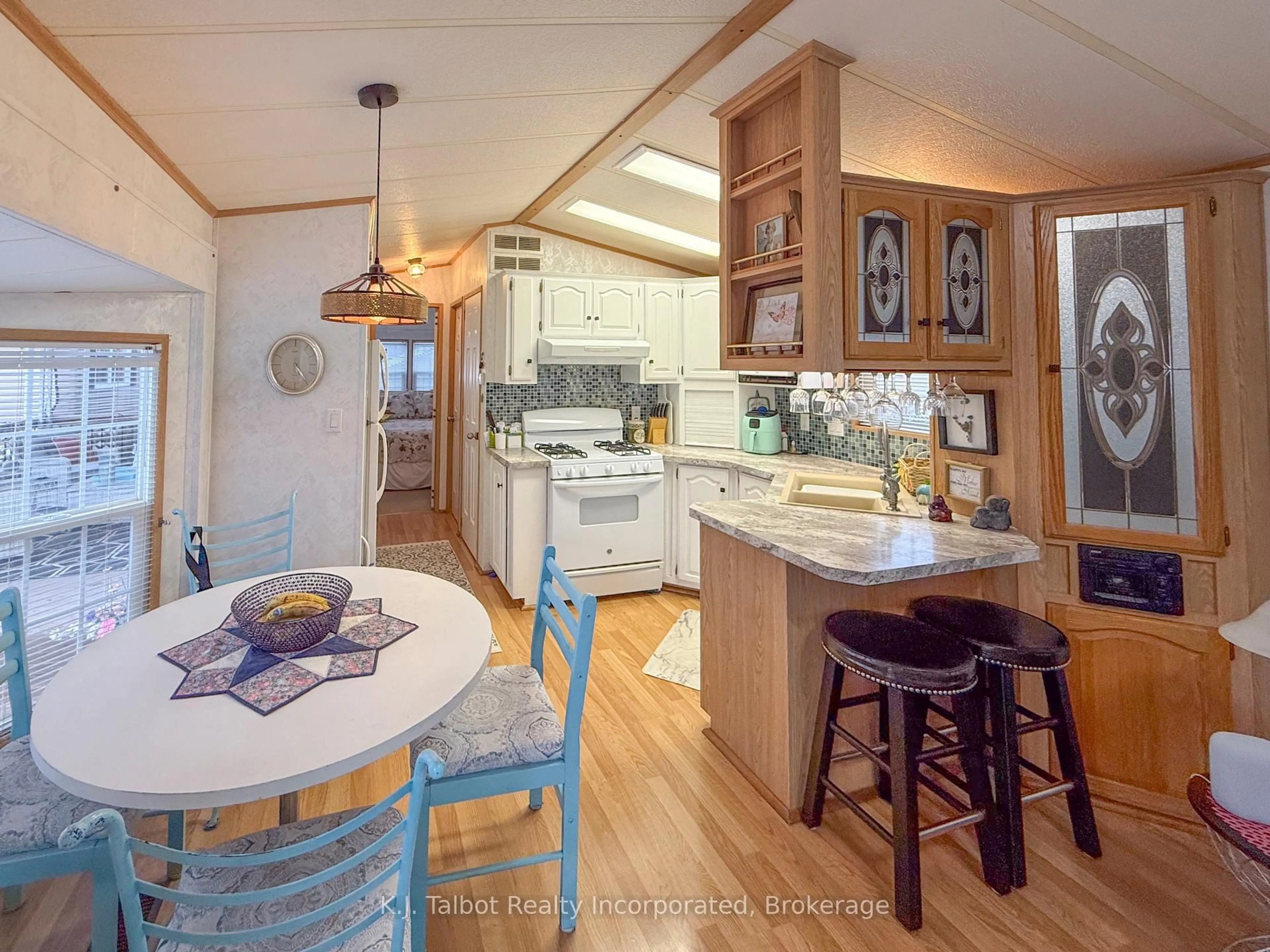 Open concept kitchen, wood/laminate floor for 77719 Bluewater Highway #45 Portside Drive N, Bluewater Ontario N0M 1G0