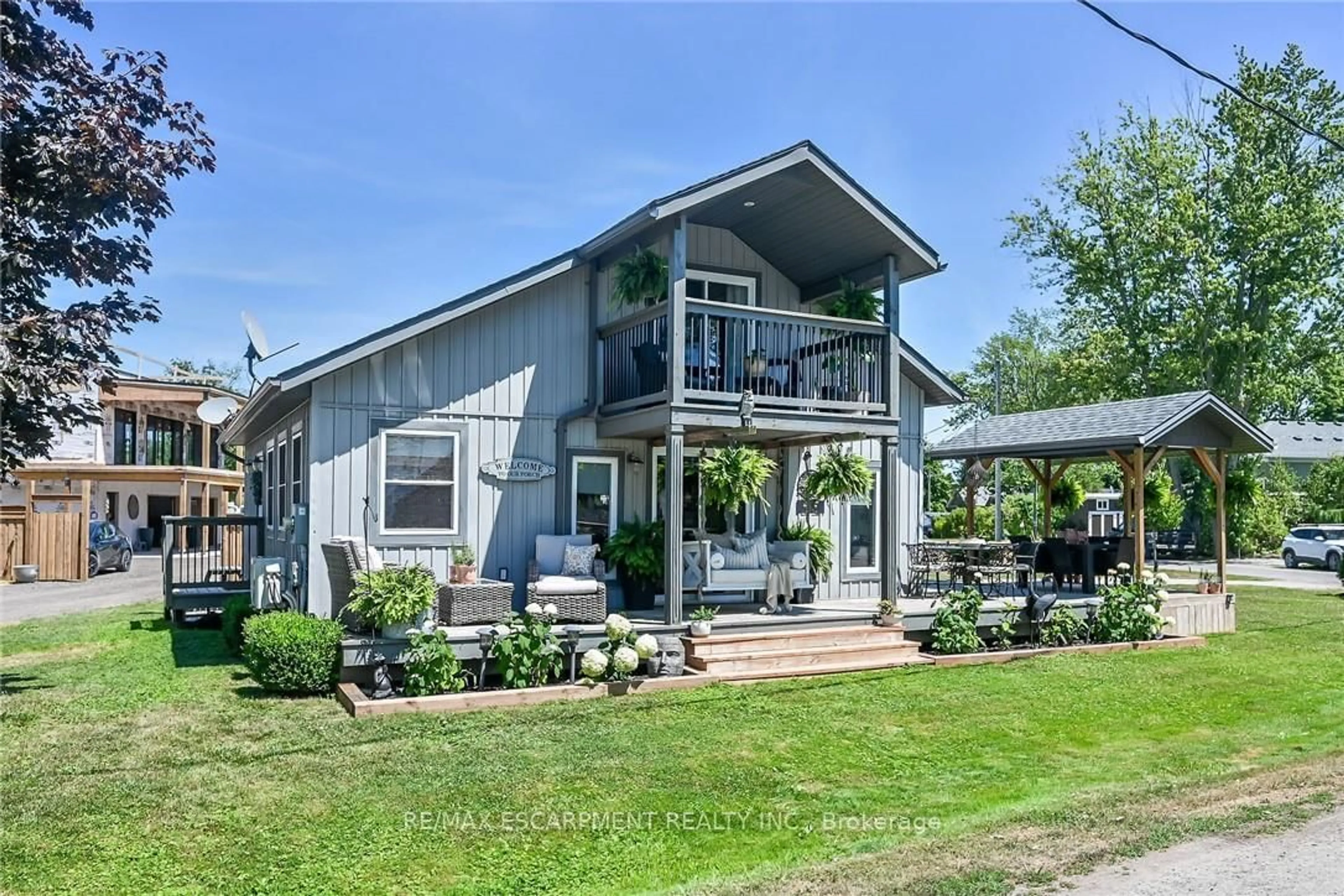 Home with vinyl exterior material, street for 55 Lakeside Dr, Haldimand Ontario N0A 1L0