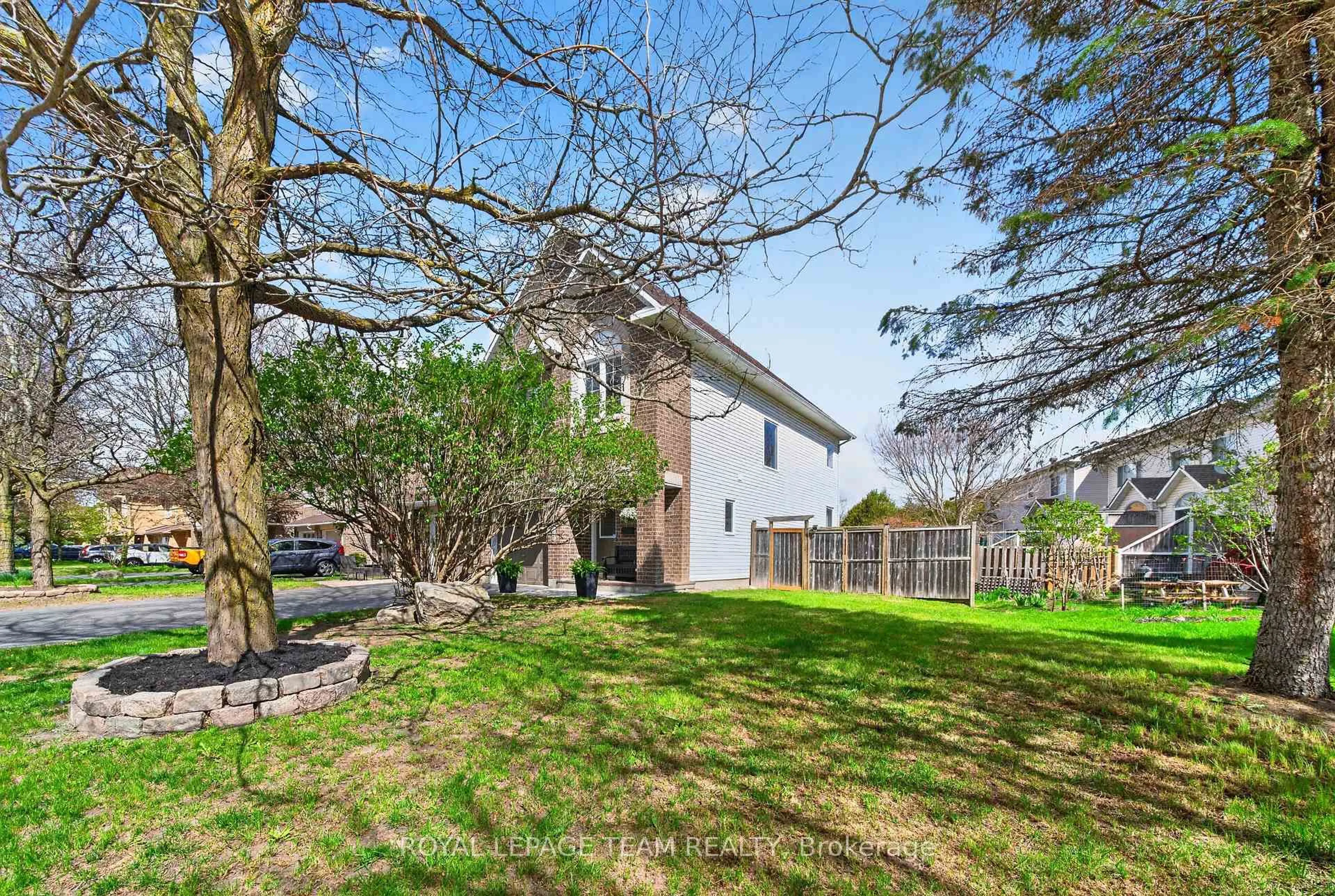 A pic from outside/outdoor area/front of a property/back of a property/a pic from drone, street for 108 Landover Cres, Ottawa Ontario K2M 2W4