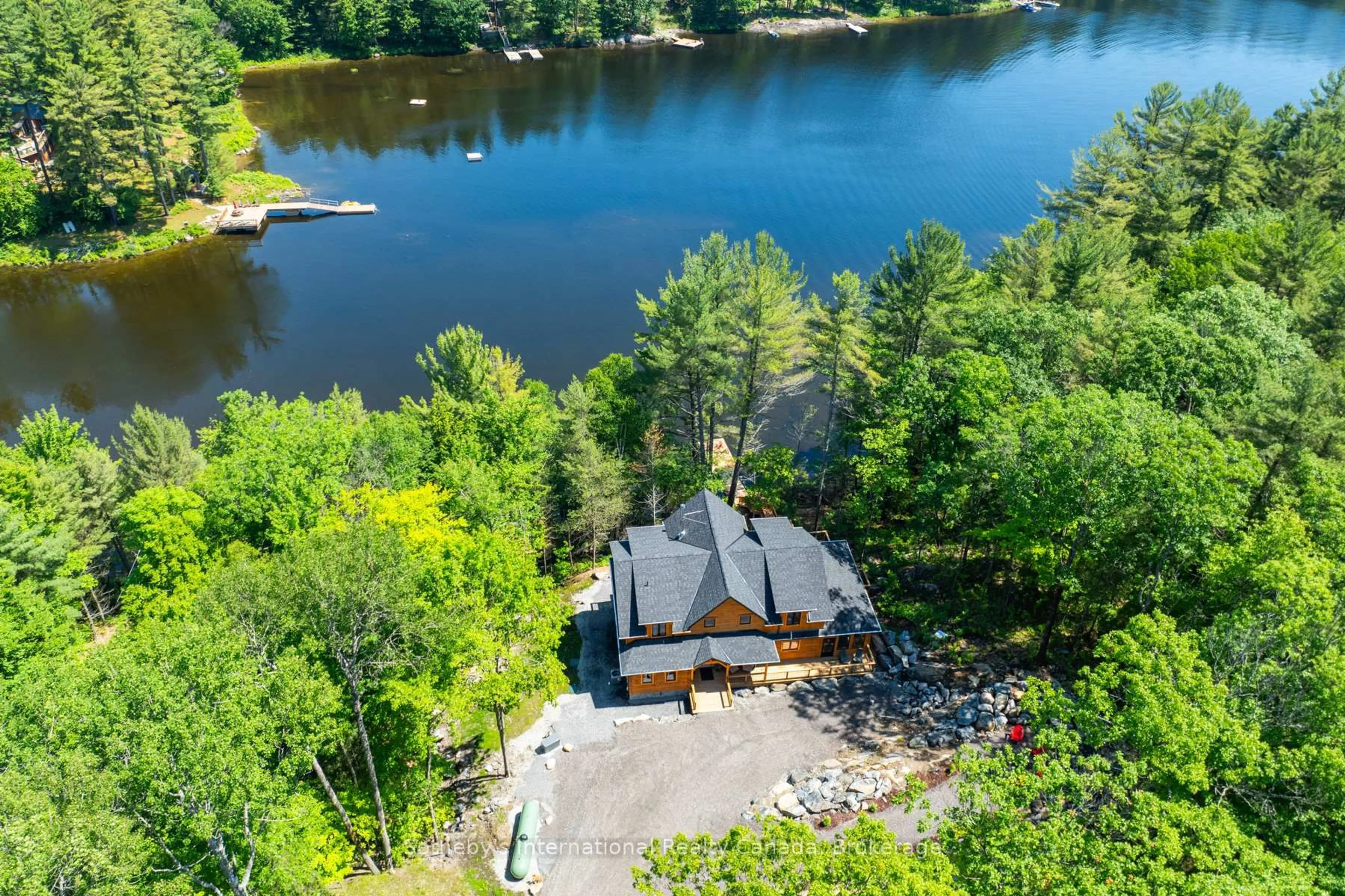 A pic from outside/outdoor area/front of a property/back of a property/a pic from drone, water/lake/river/ocean view for 1213 CAMP JACKSON Rd #15, Muskoka Lakes Ontario P0C 1A0