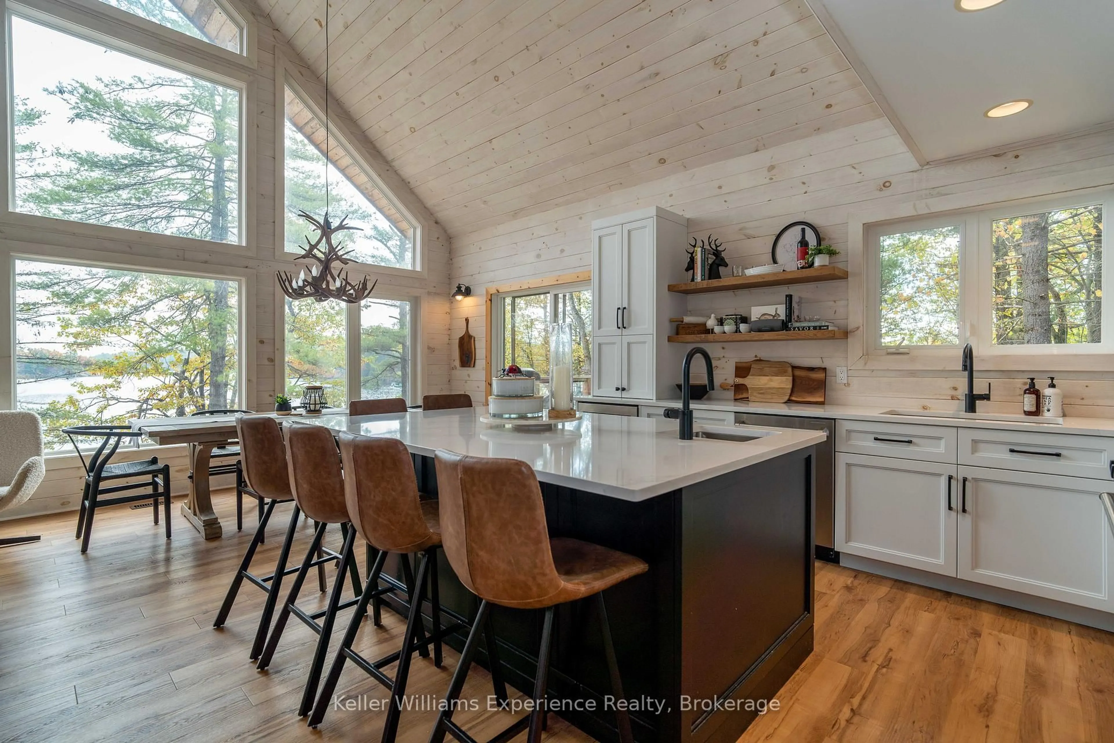 Open concept kitchen, wood/laminate floor for 1317 West Lionshead Rd, Gravenhurst Ontario N0H 1W0
