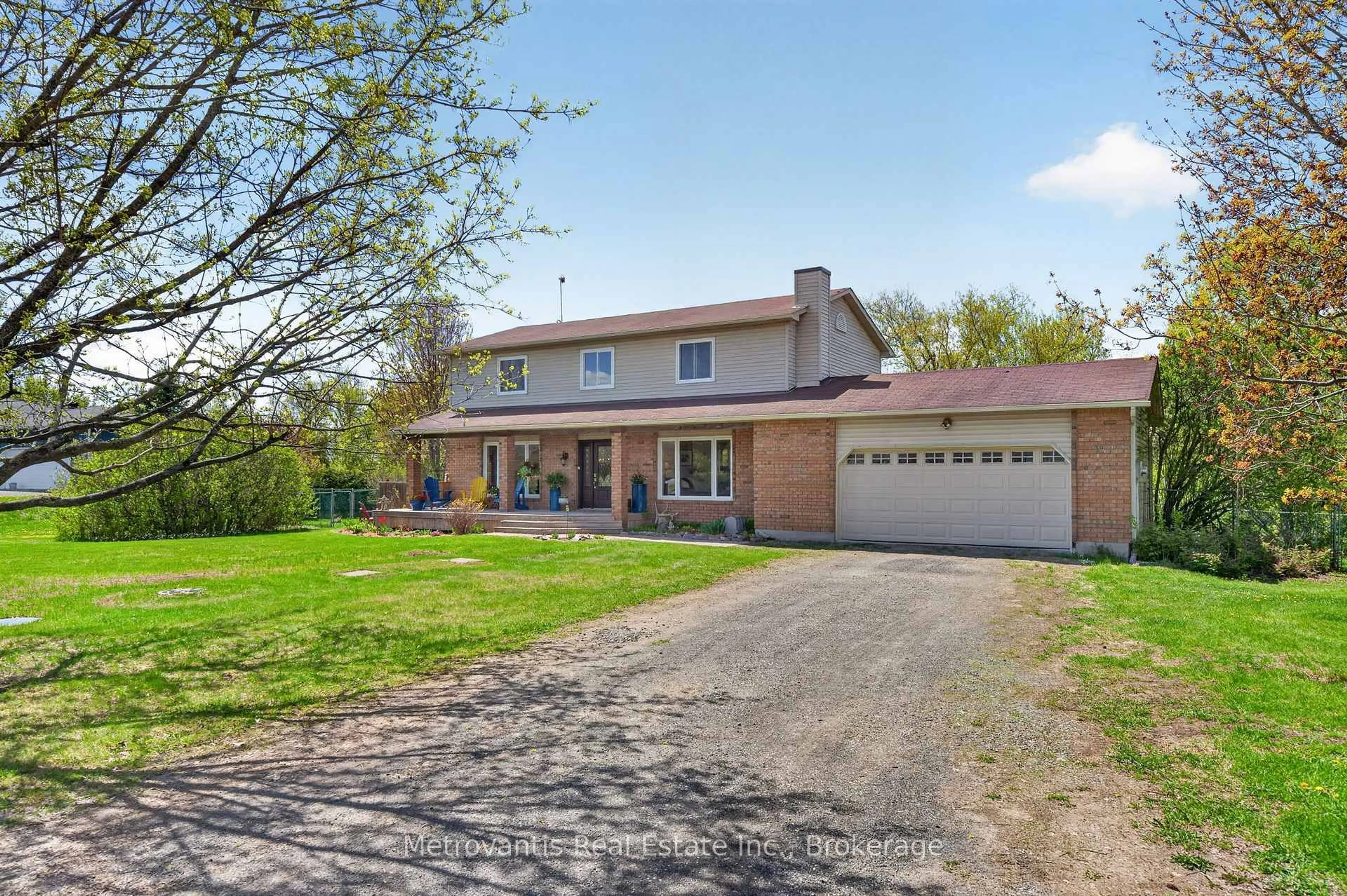 A pic from outside/outdoor area/front of a property/back of a property/a pic from drone, street for 1646 Groves Rd, Russell Ontario K4R 1E5