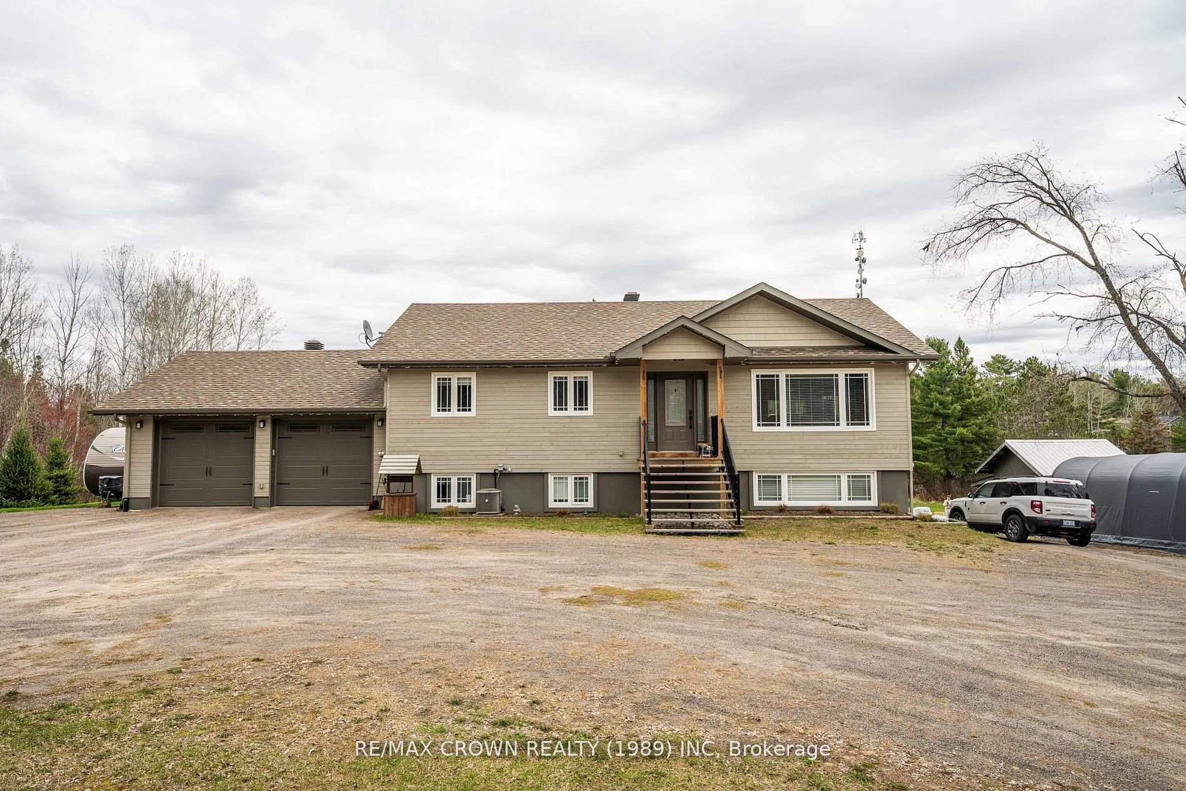 A pic from outside/outdoor area/front of a property/back of a property/a pic from drone, unknown for 211 Eglington Rd, East Ferris Ontario P0H 1H0