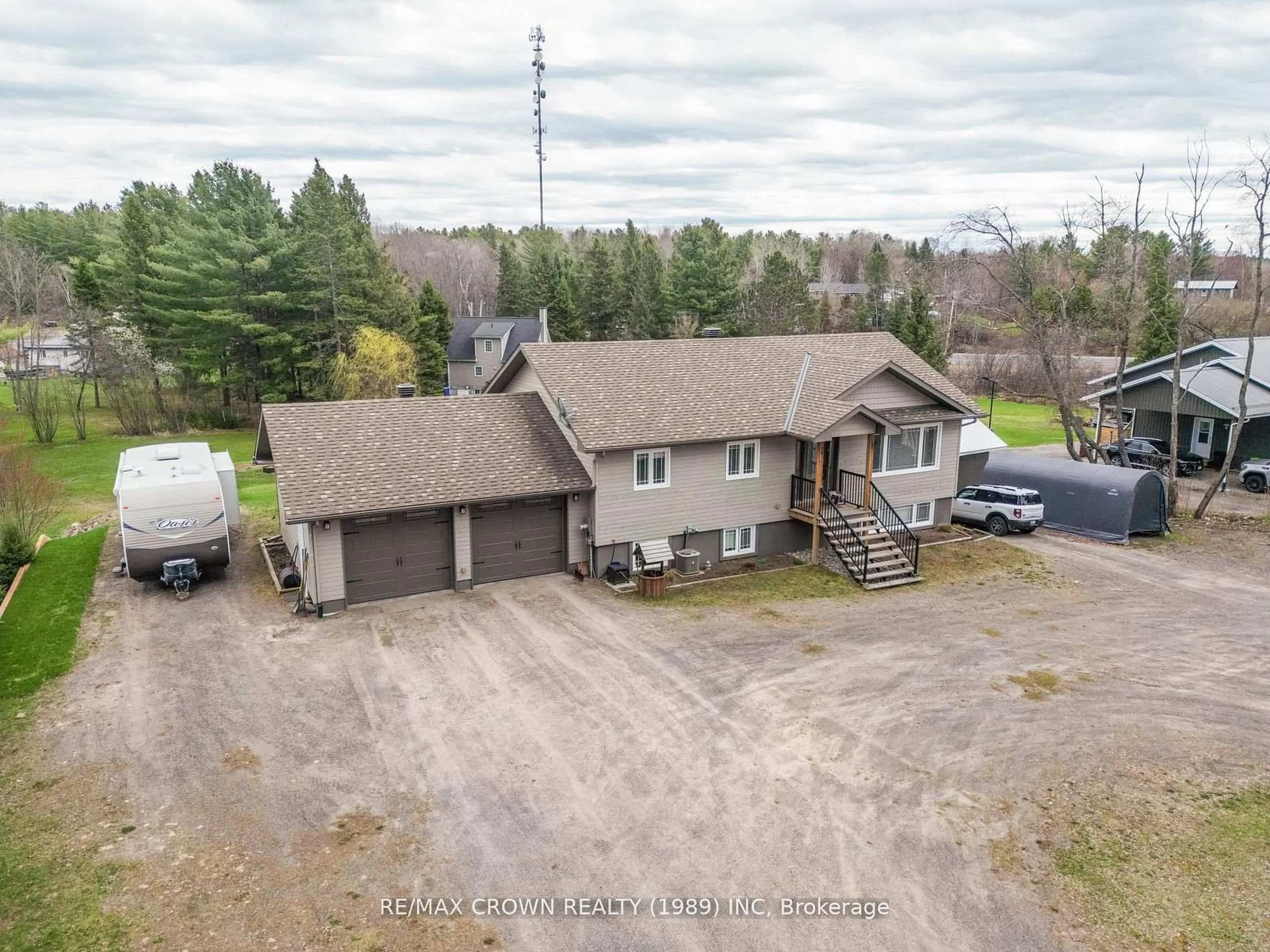 A pic from outside/outdoor area/front of a property/back of a property/a pic from drone, unknown for 211 Eglington Rd, East Ferris Ontario P0H 1H0