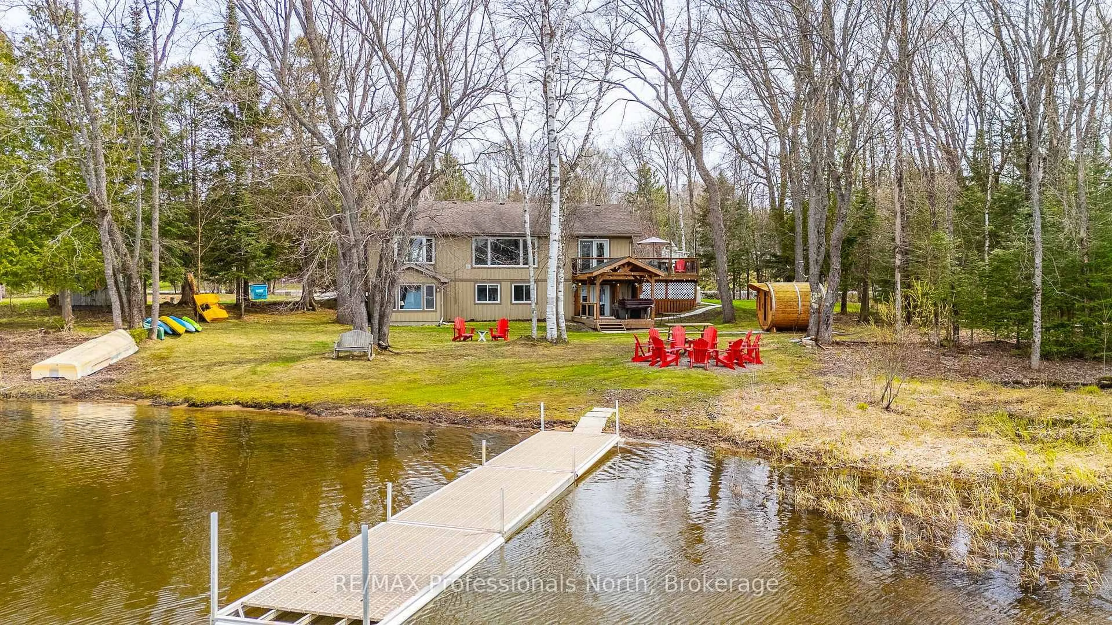 A pic from outside/outdoor area/front of a property/back of a property/a pic from drone, water/lake/river/ocean view for 11357 Highway 118, Dysart et al Ontario K0M 1S0