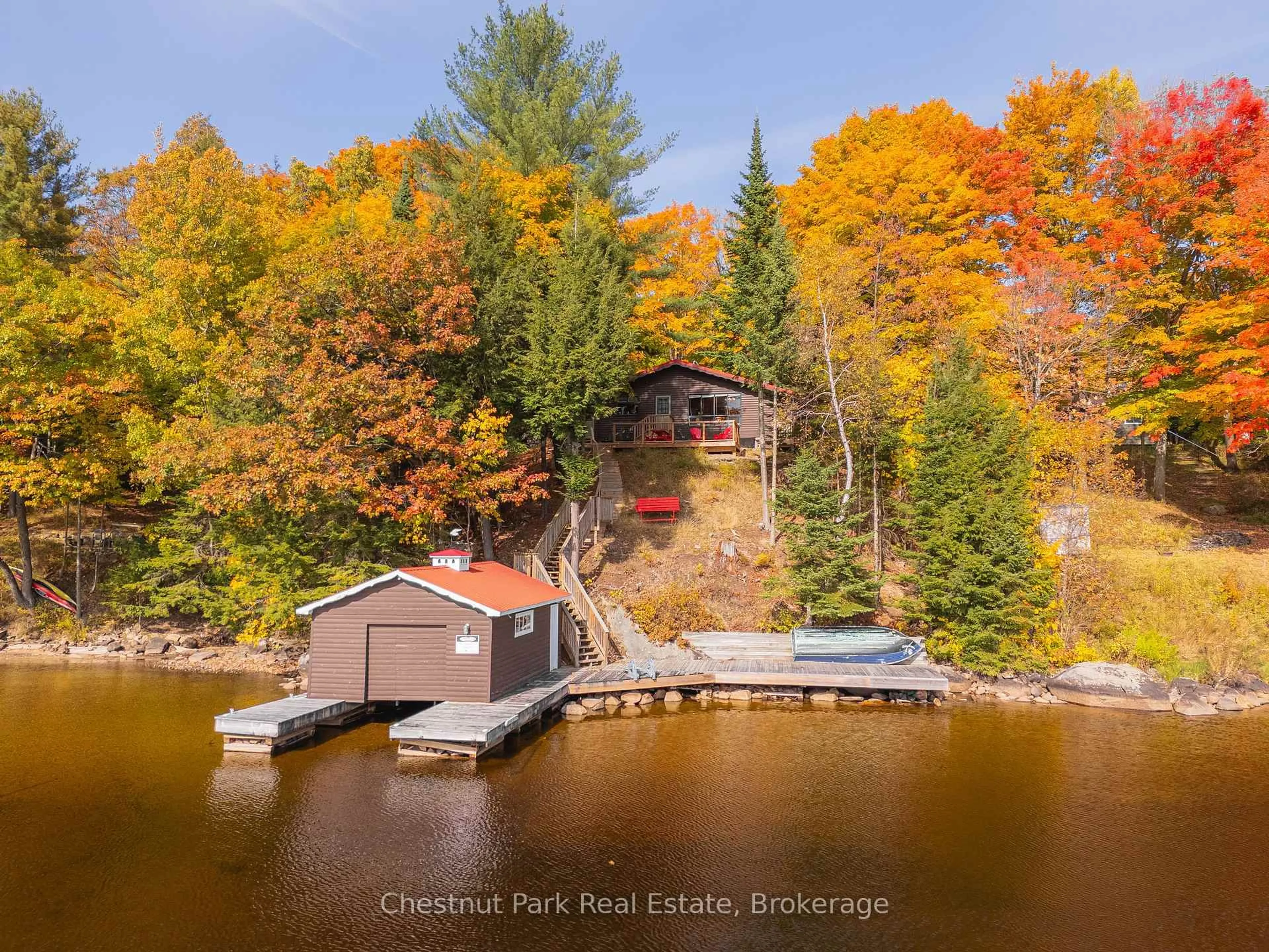 A pic from outside/outdoor area/front of a property/back of a property/a pic from drone, water/lake/river/ocean view for 639 Evergreen Tr, Huntsville Ontario P0B 1M0