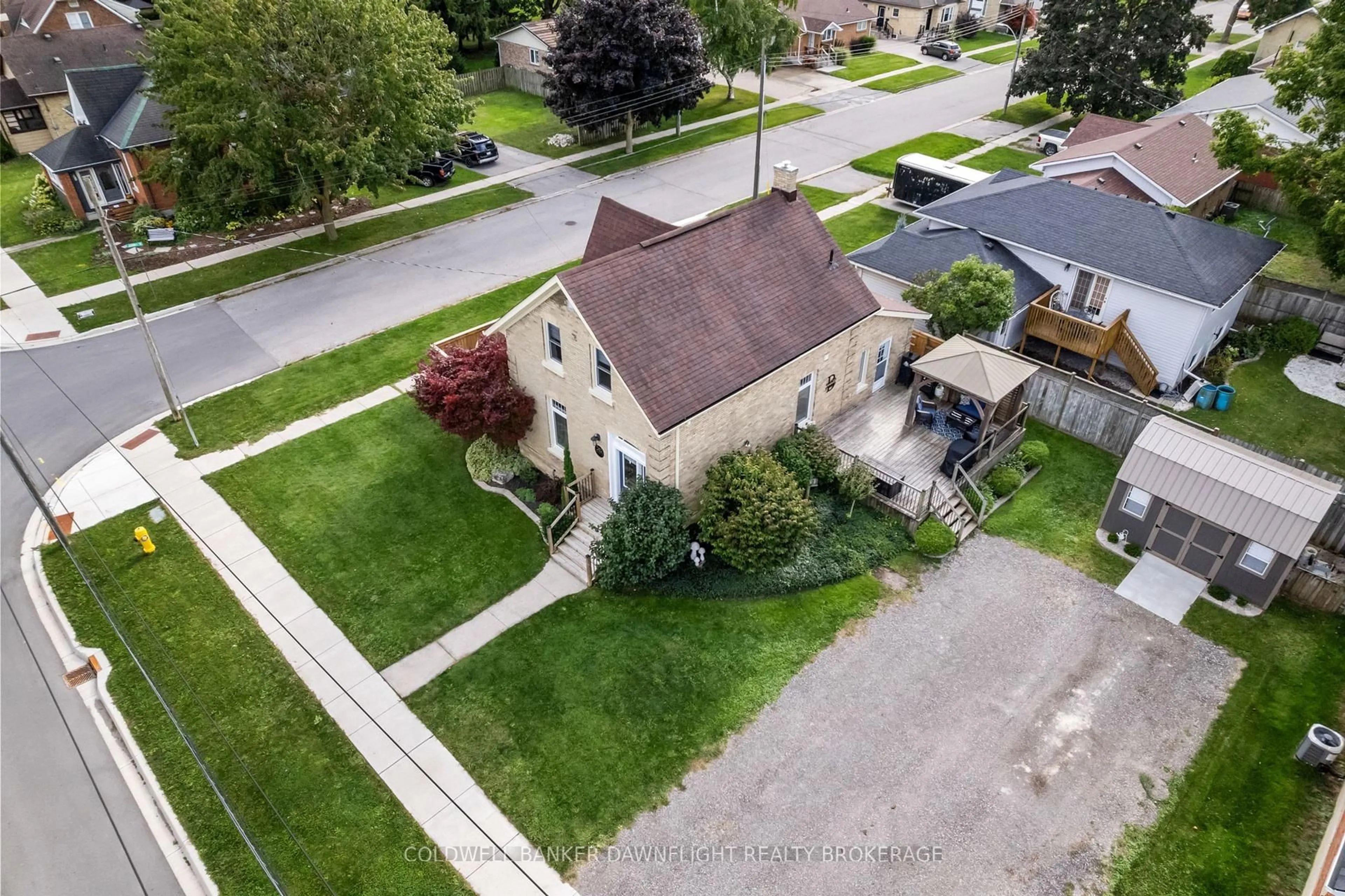 A pic from outside/outdoor area/front of a property/back of a property/a pic from drone, street for 383 William St, South Huron Ontario N0M 1S2