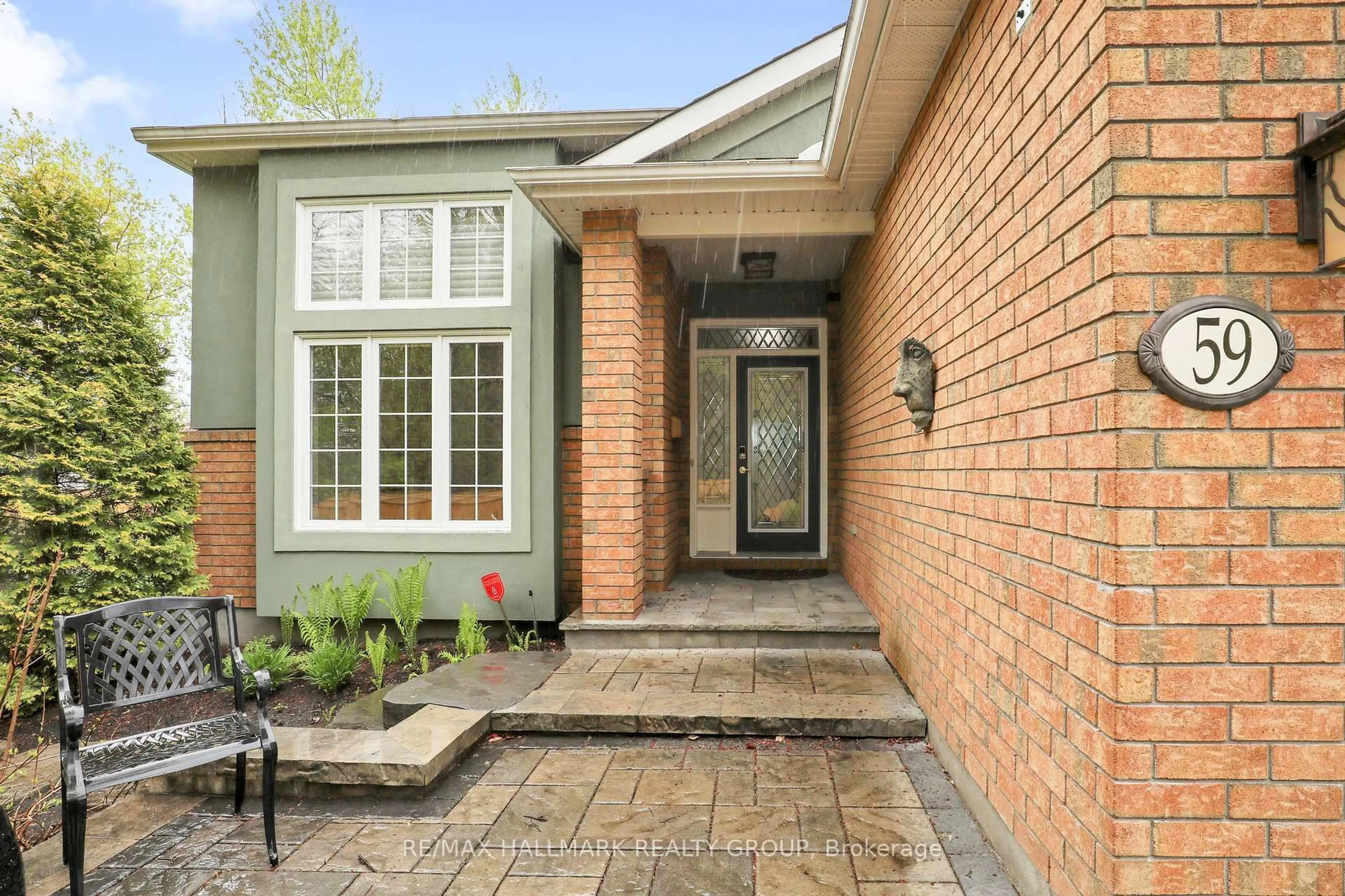 Home with brick exterior material, street for 59 Paxton Lane, Ottawa Ontario K1B 1B7