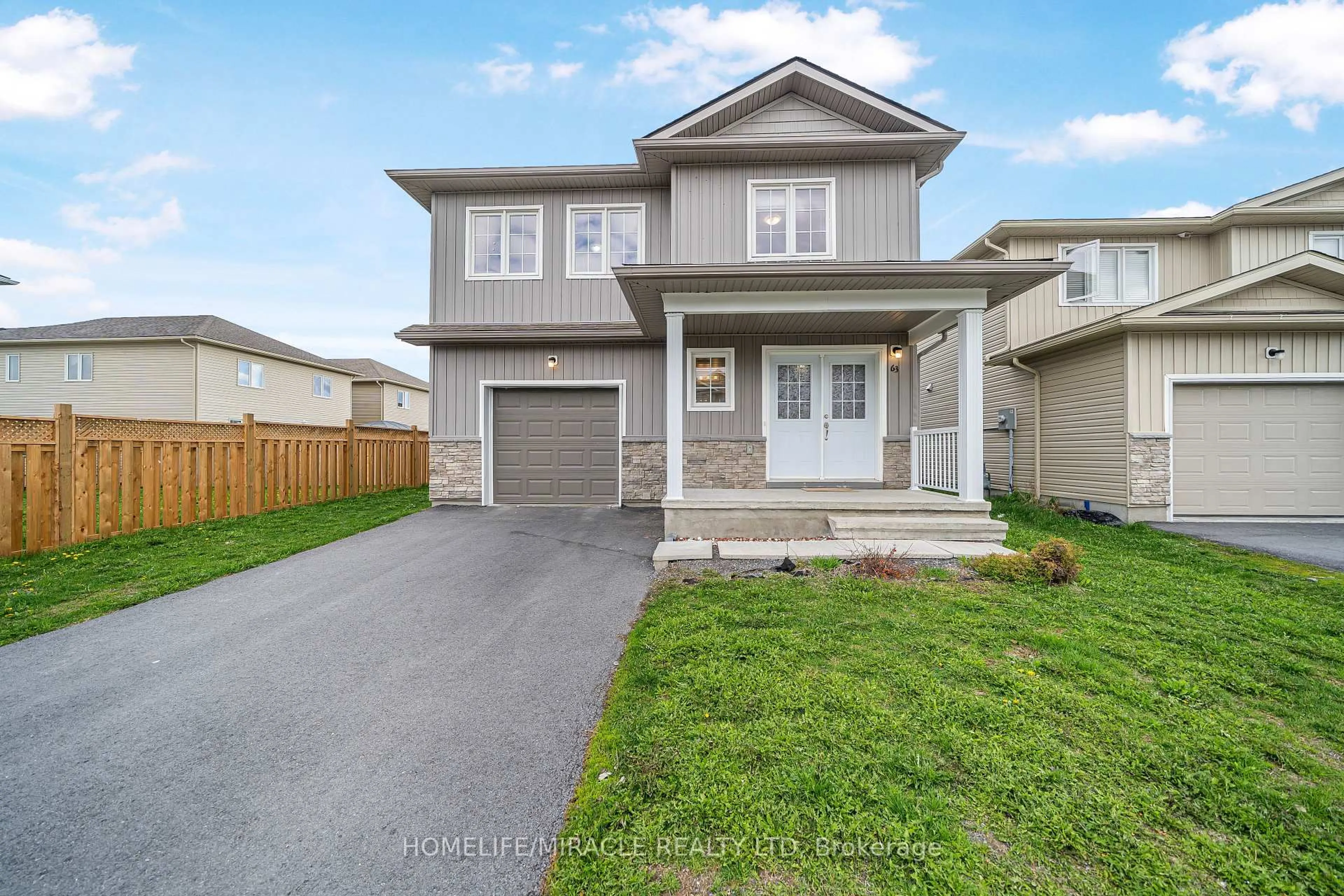 Home with vinyl exterior material, street for 63 Brennan Cres, Bissett Creek Ontario K0H 2H0