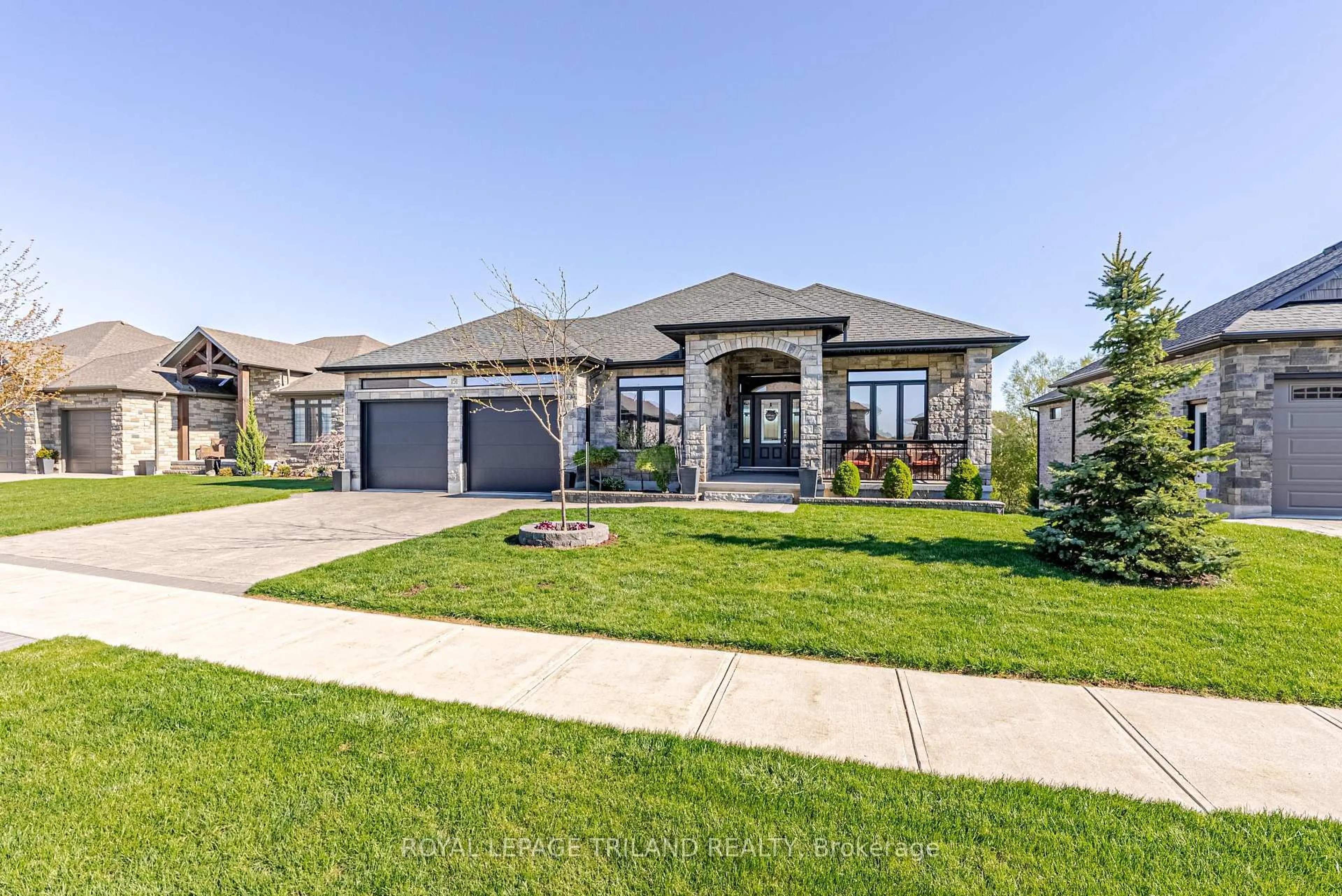 Home with brick exterior material, street for 151 Robin Ridge Dr, Central Elgin Ontario N0L 1B0