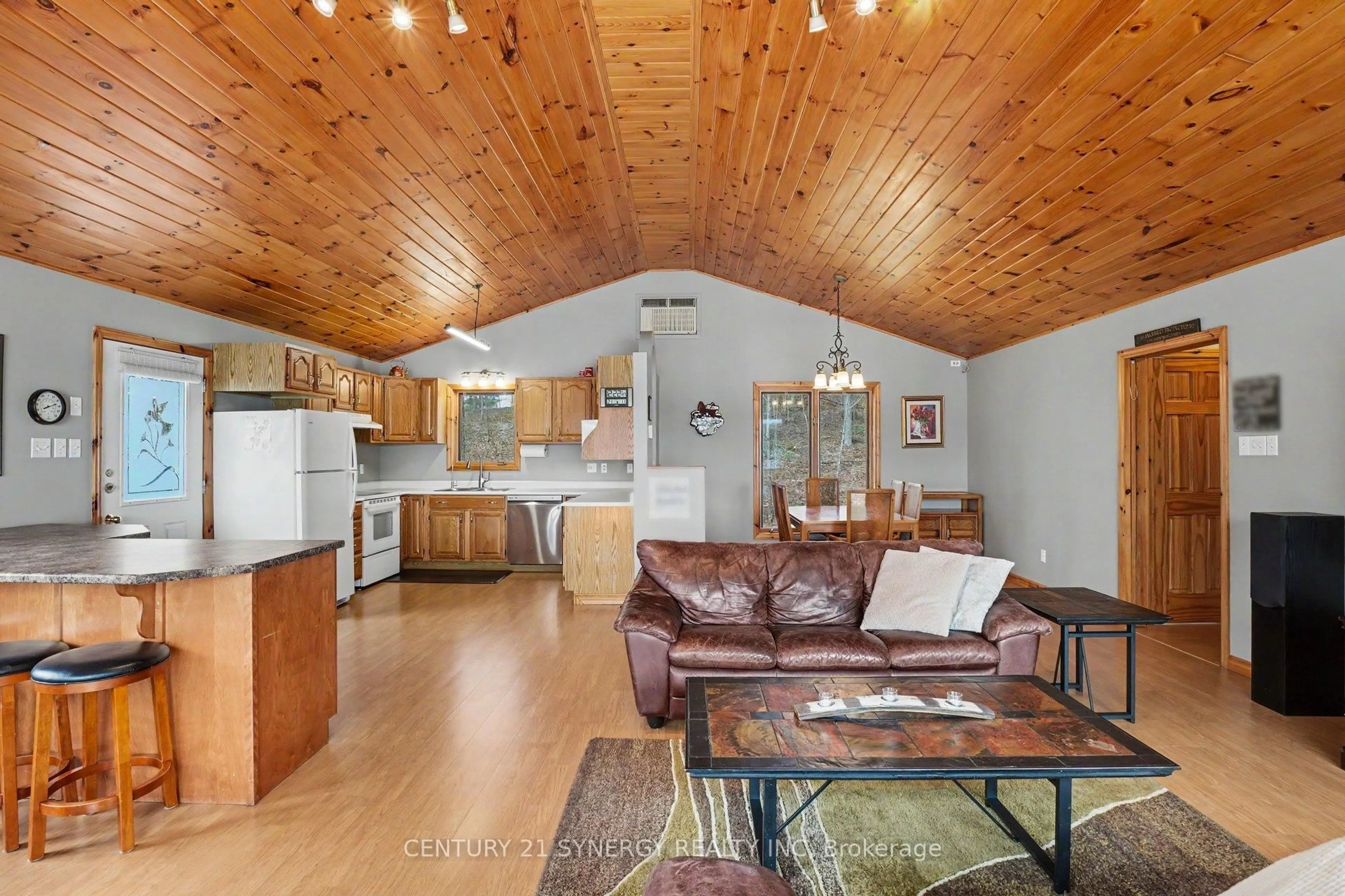 Open concept kitchen, wood/laminate floor for 773 Sherbrooke Dr, Maberly Ontario K0H 2B0