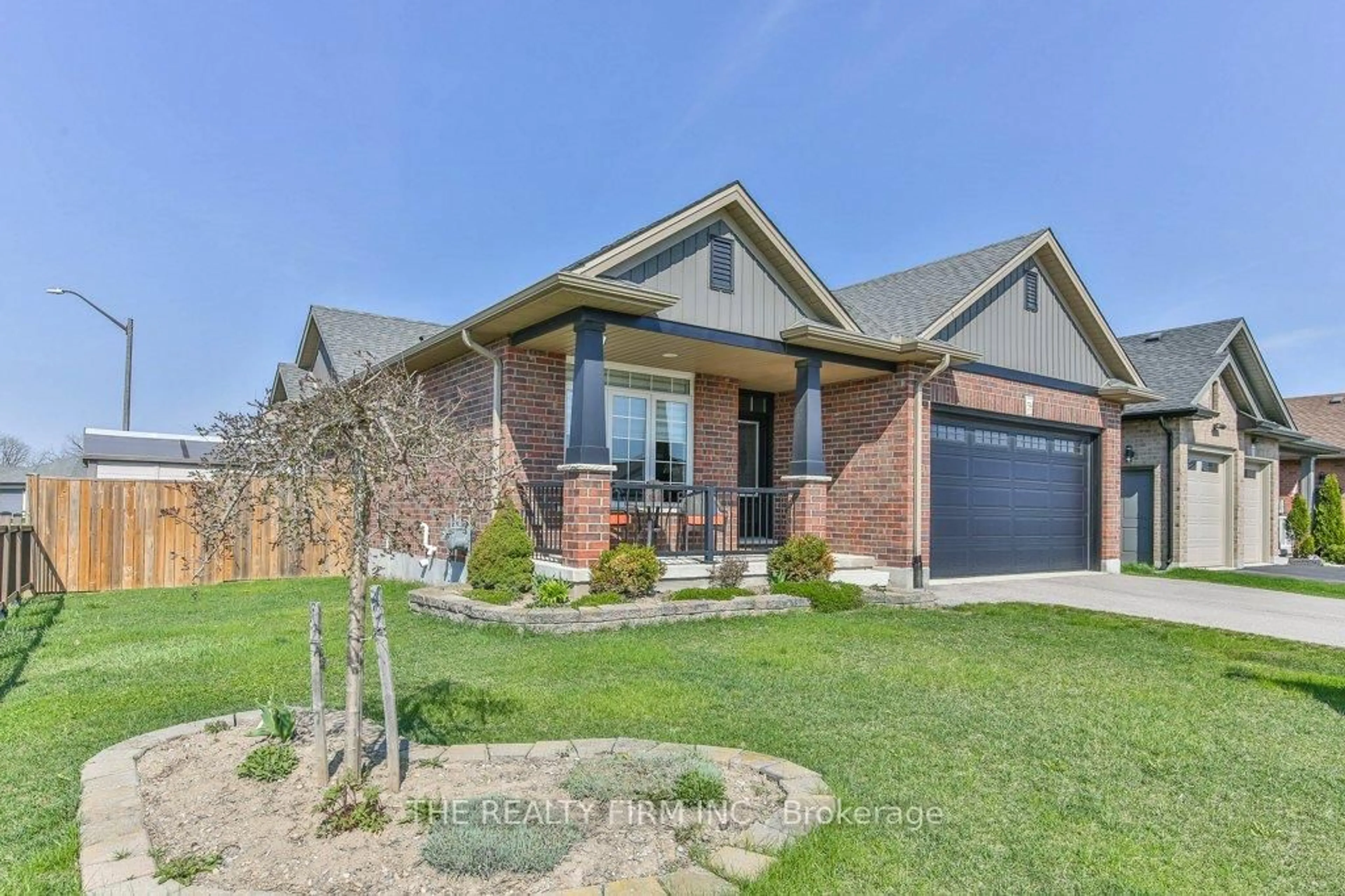 Home with brick exterior material, street for 59 Freeman Lane, Central Elgin Ontario N5P 0E5