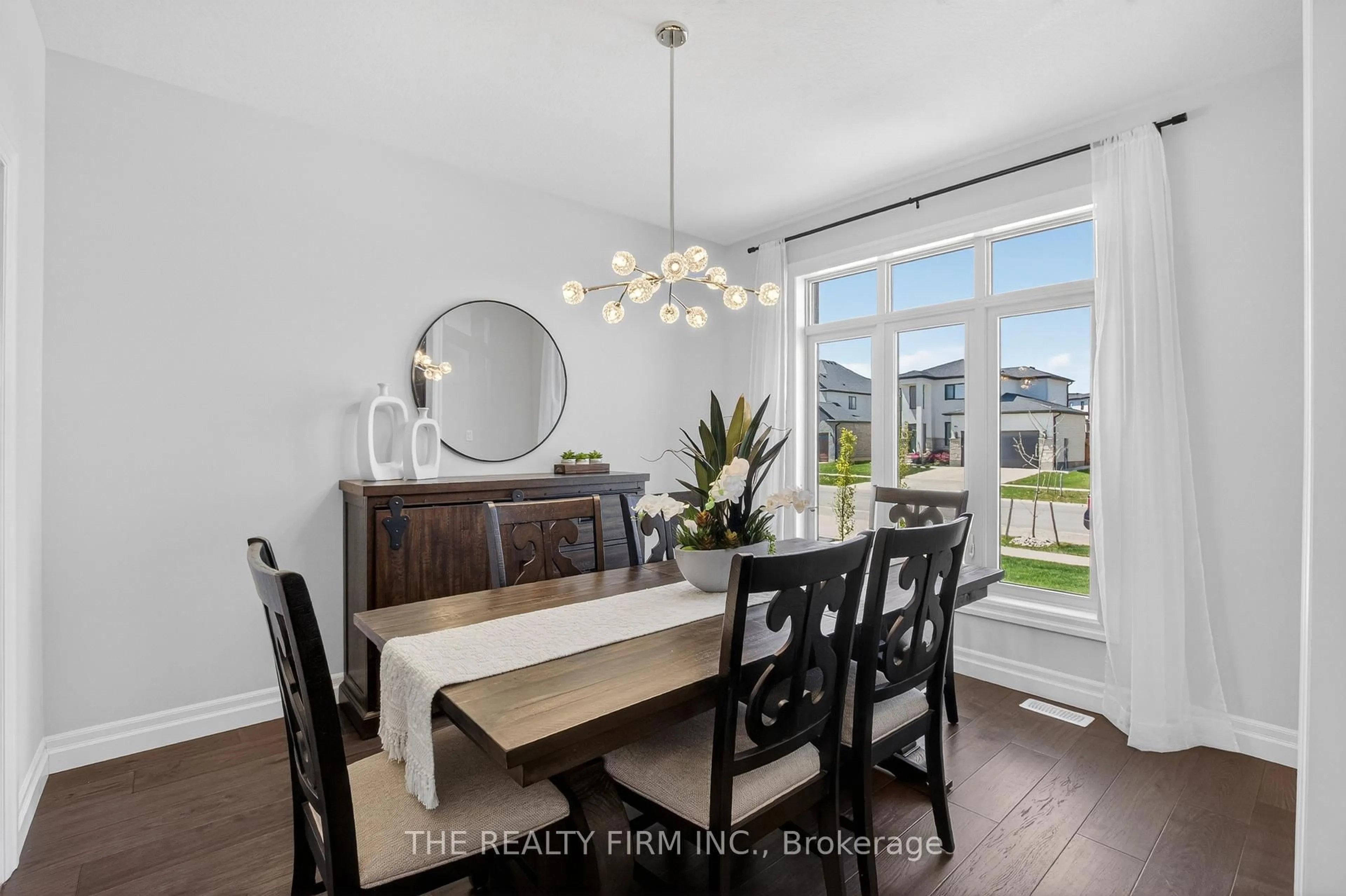 Dining room, wood/laminate floor for 87 Daventry Way, Middlesex Centre Ontario N0L 1R0