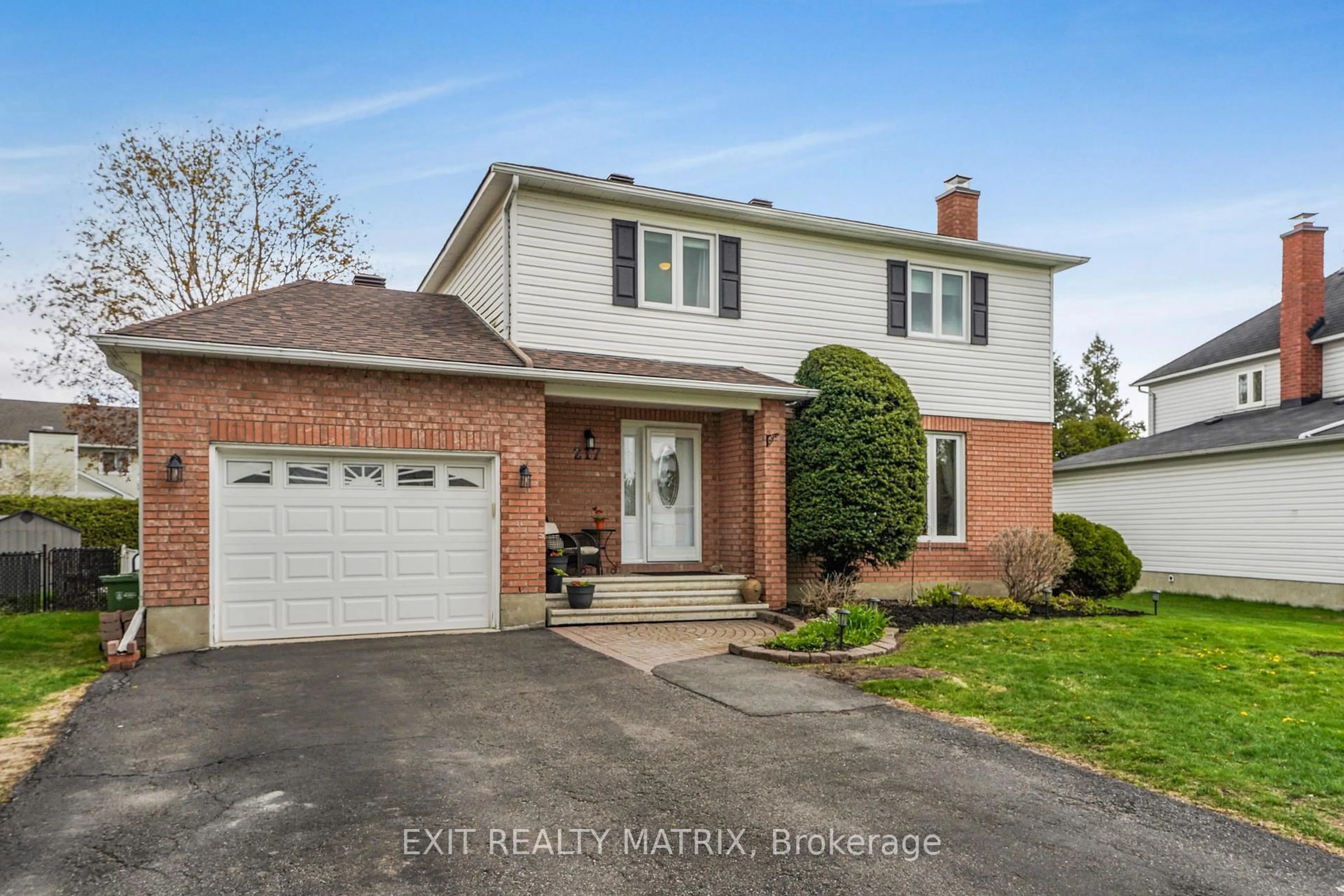 Home with brick exterior material, street for 217 MacDougall St, Russell Ontario K4R 1A5
