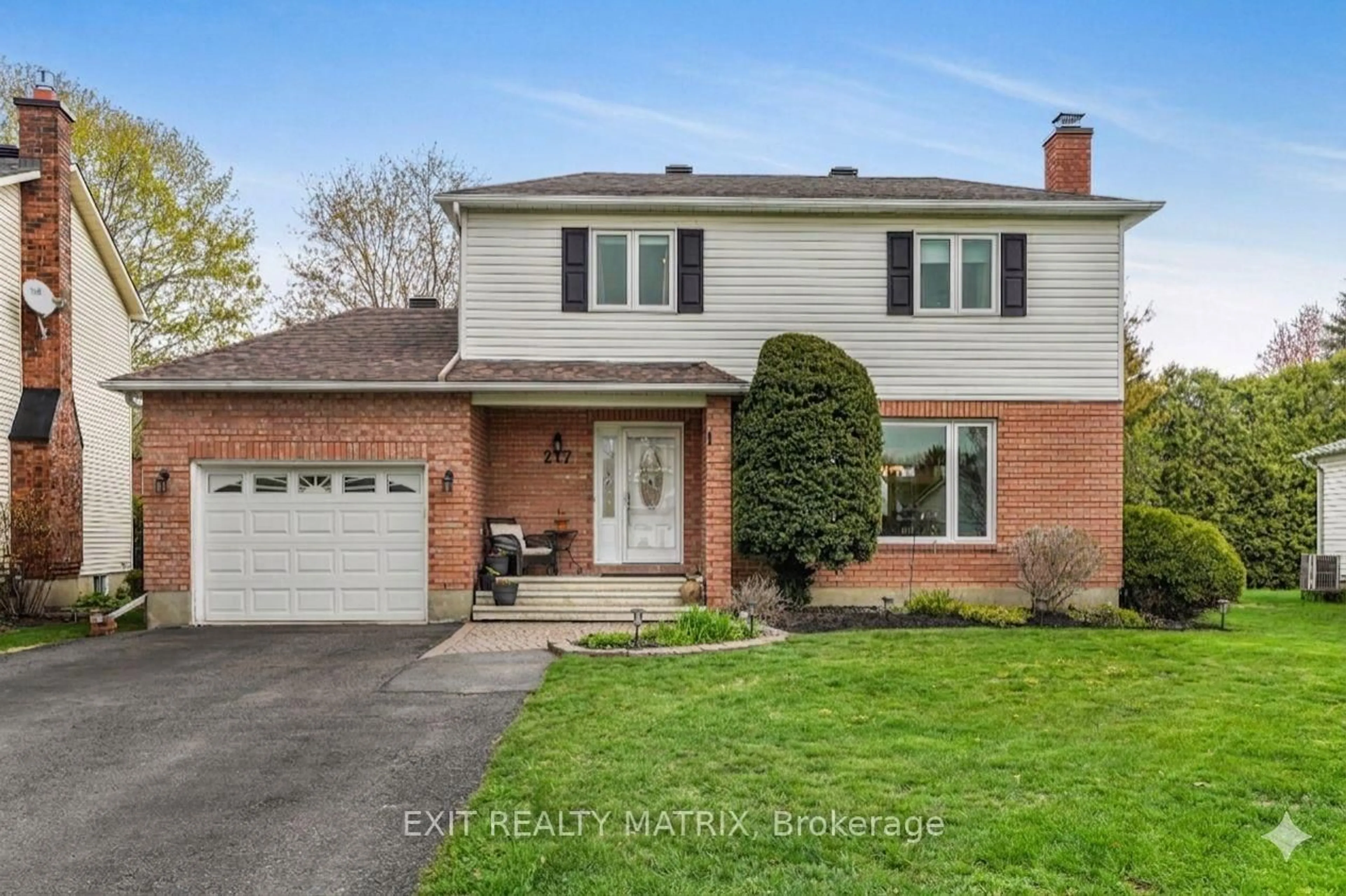 Home with brick exterior material, street for 217 MacDougall St, Russell Ontario K4R 1A5
