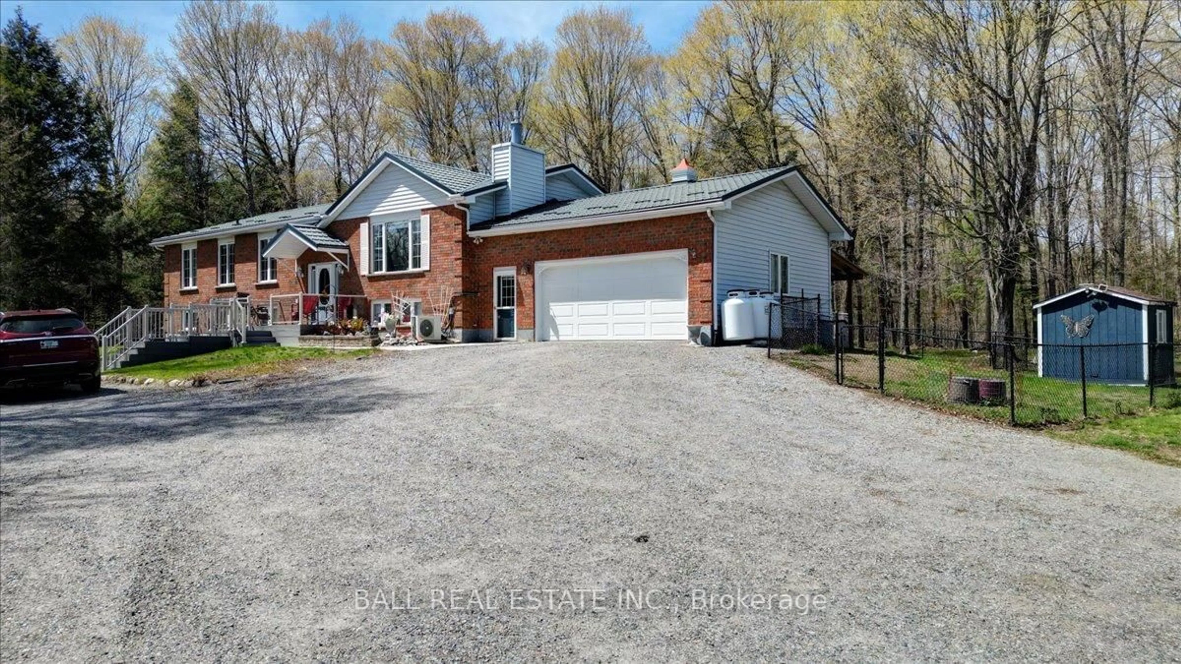 A pic from outside/outdoor area/front of a property/back of a property/a pic from drone, street for 12482 Highway 28, North Kawartha Ontario K0L 1A0