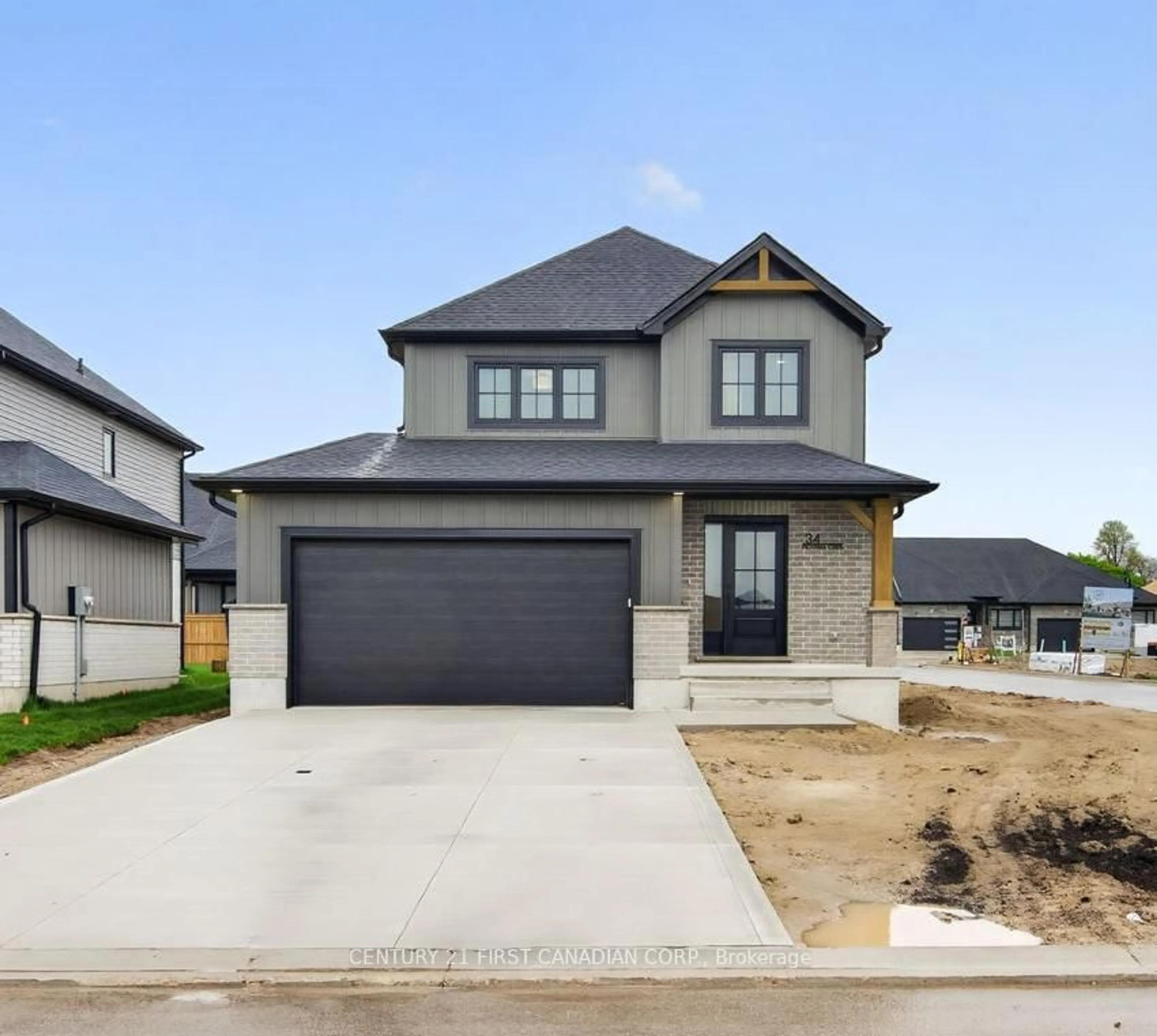 Home with brick exterior material, street for 34 Postma Cres, North Middlesex Ontario N0M 1A0