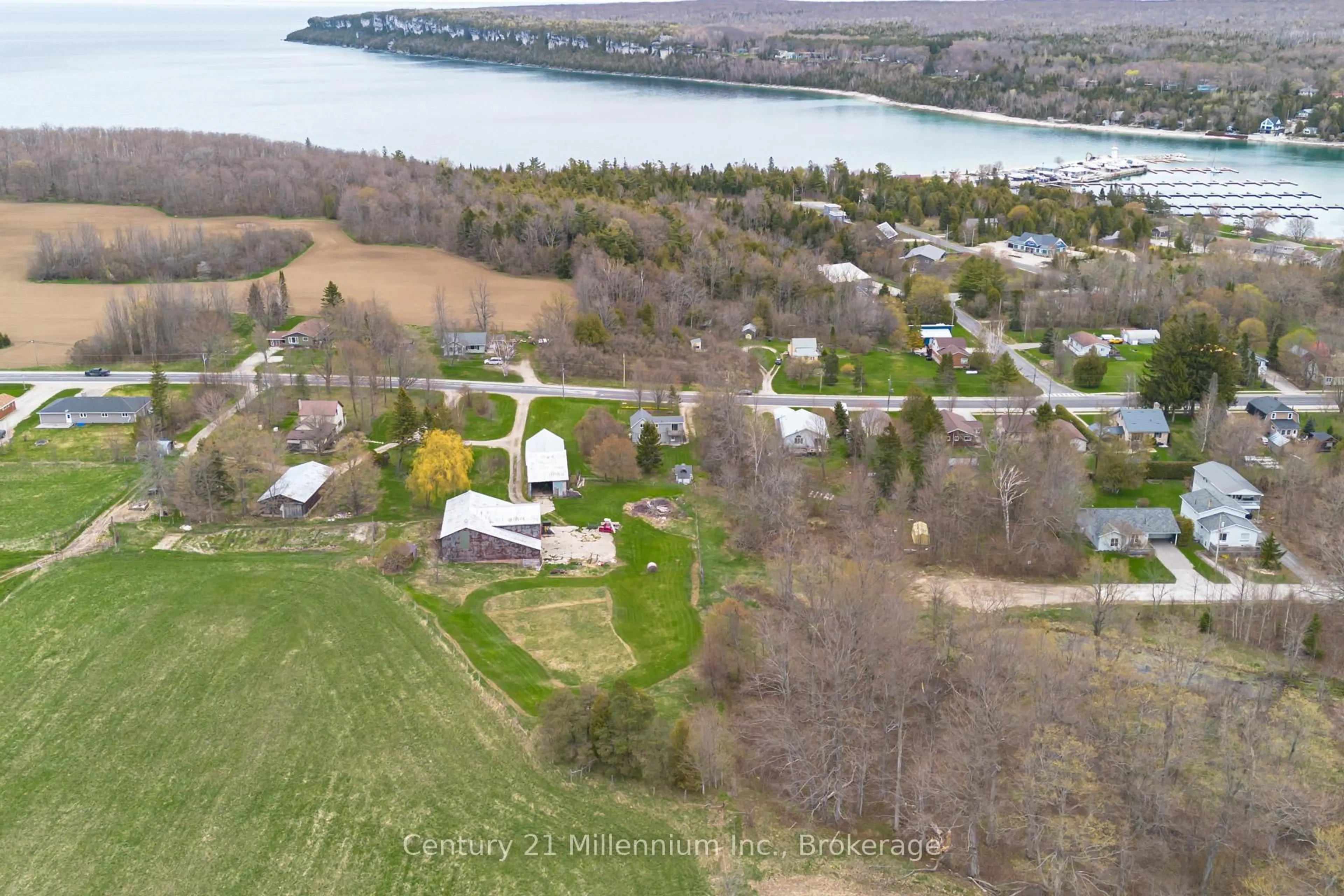 A pic from outside/outdoor area/front of a property/back of a property/a pic from drone, water/lake/river/ocean view for 124 MAIN St, Northern Bruce Peninsula Ontario N0H 1W0
