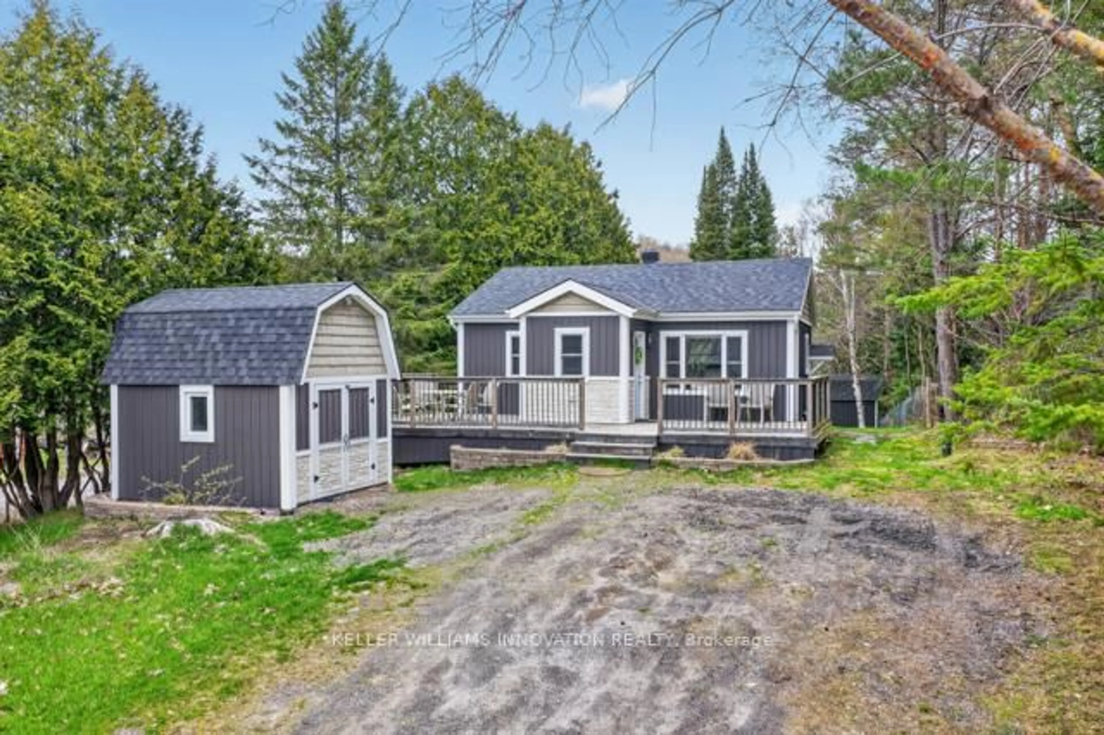 A pic from outside/outdoor area/front of a property/back of a property/a pic from drone, street for 469 Rowanwood Rd, Huntsville Ontario P0B 1M0