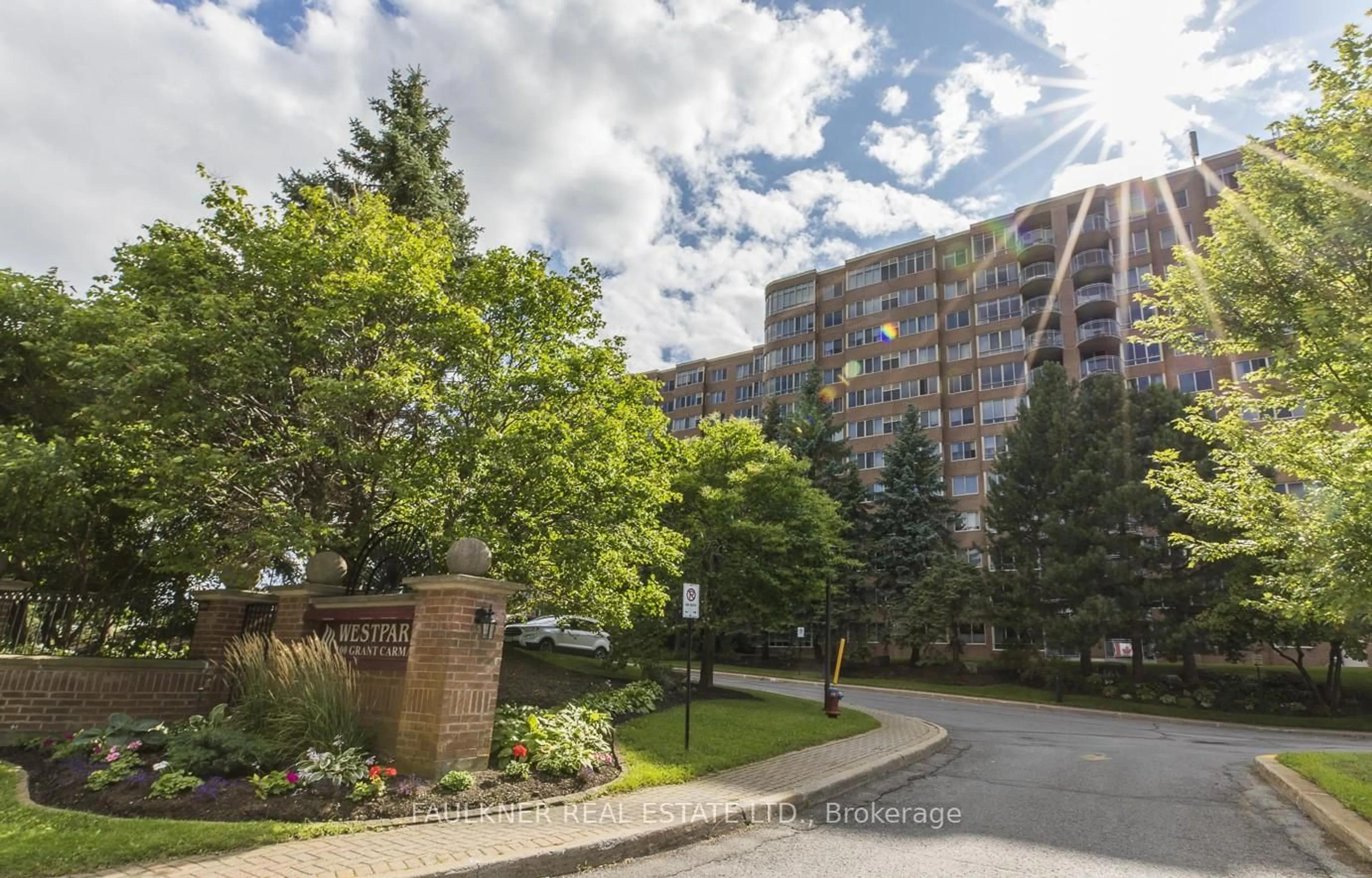 A pic from outside/outdoor area/front of a property/back of a property/a pic from drone, street for 100 Grant Carman Dr #111, Ottawa Ontario K2E 8B8