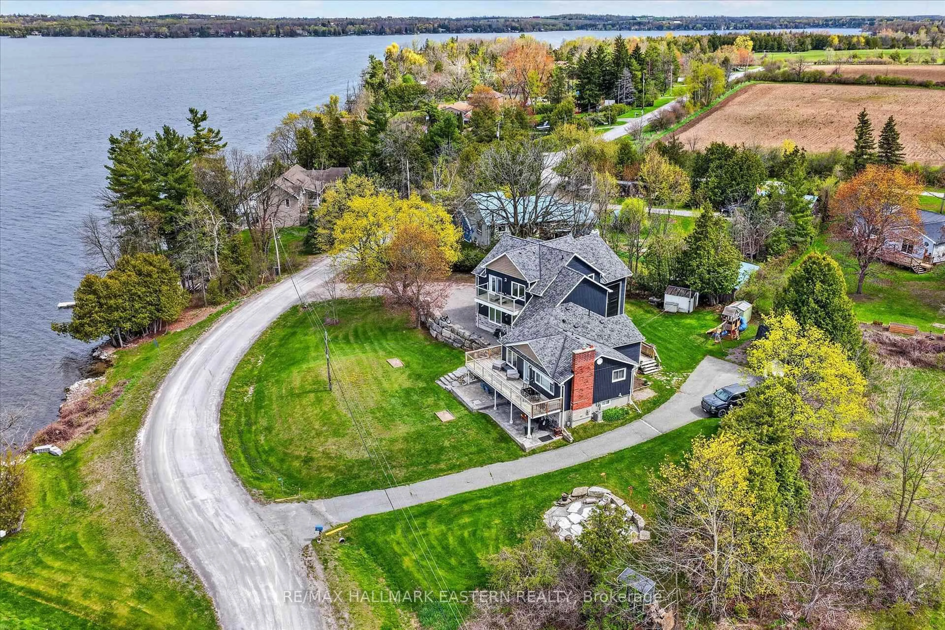 A pic from outside/outdoor area/front of a property/back of a property/a pic from drone, water/lake/river/ocean view for 1258 Gail Park Dr, Selwyn Ontario K0L 1T0