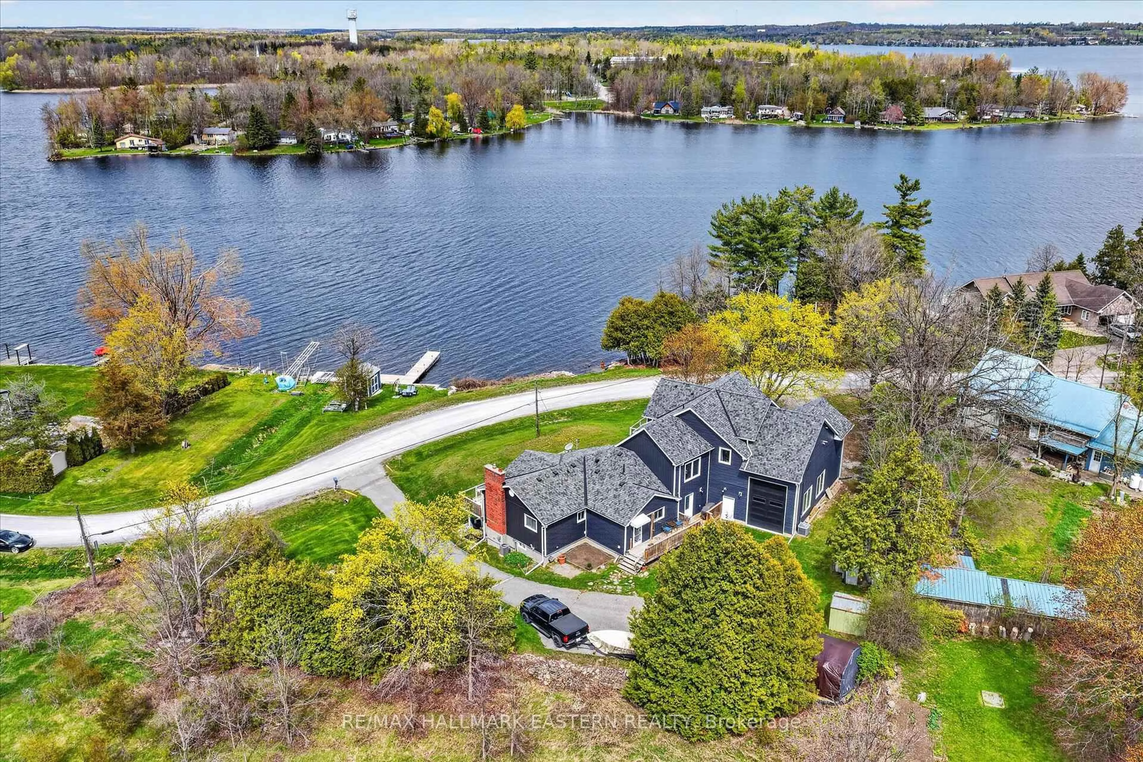 A pic from outside/outdoor area/front of a property/back of a property/a pic from drone, water/lake/river/ocean view for 1258 Gail Park Dr, Selwyn Ontario K0L 1T0