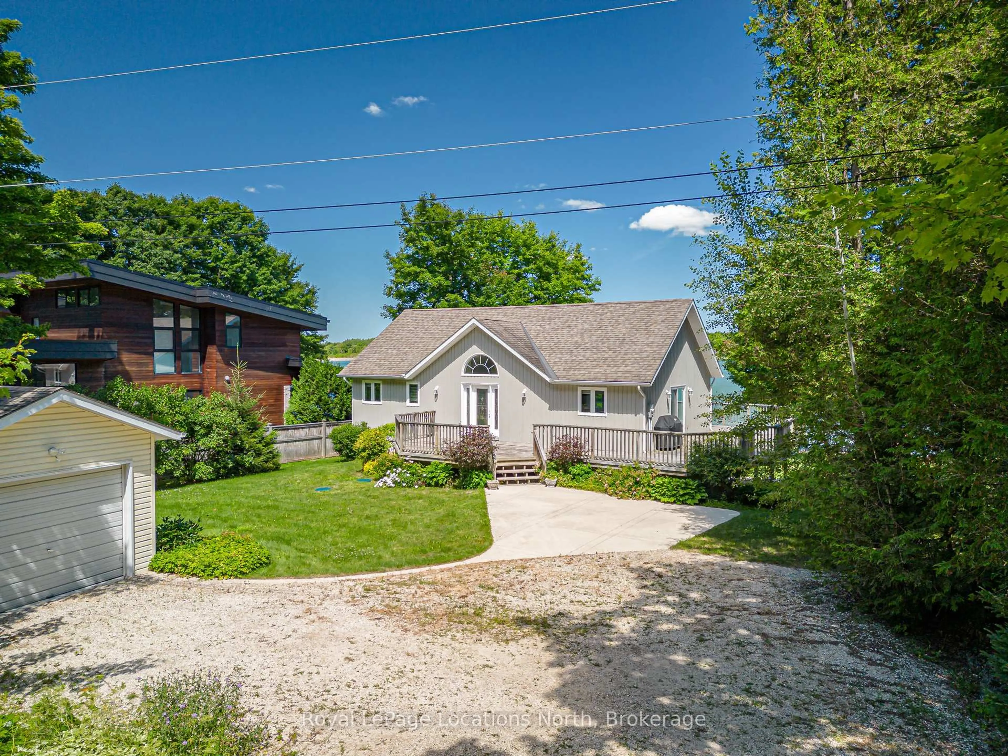 A pic from outside/outdoor area/front of a property/back of a property/a pic from drone, street for 115 South Shores Rd, Grey Highlands Ontario N0C 1E0