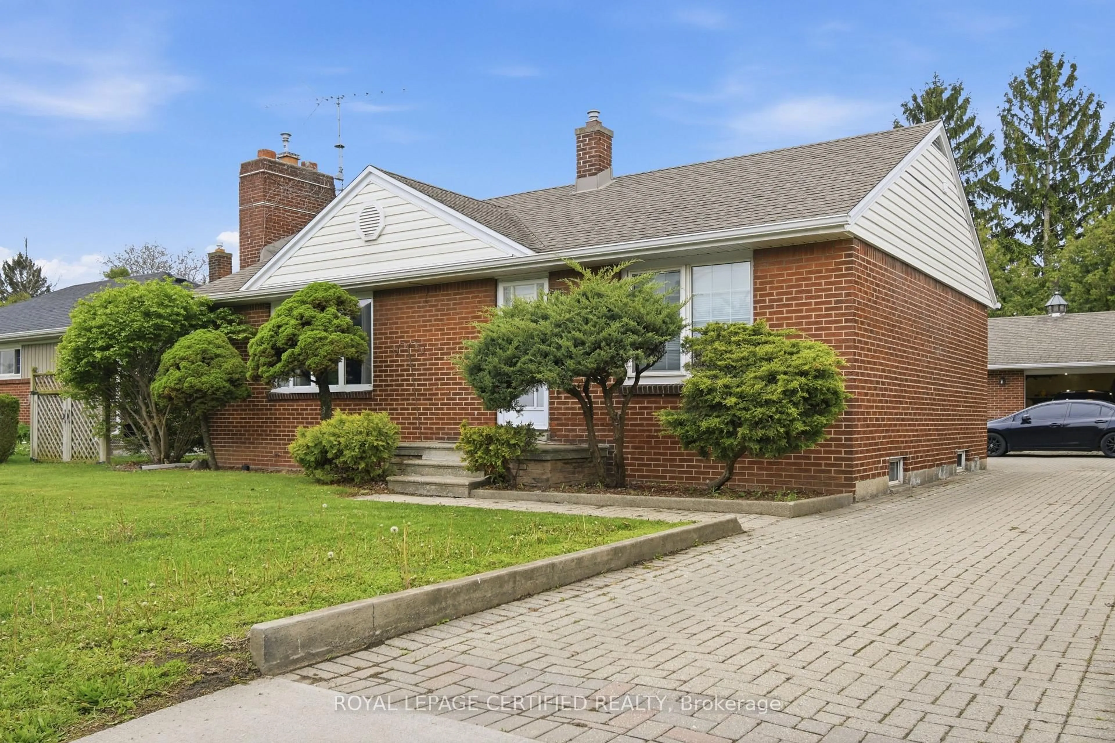Home with brick exterior material, street for 2485 Dominion Blvd, Windsor Ontario N9E 2M5