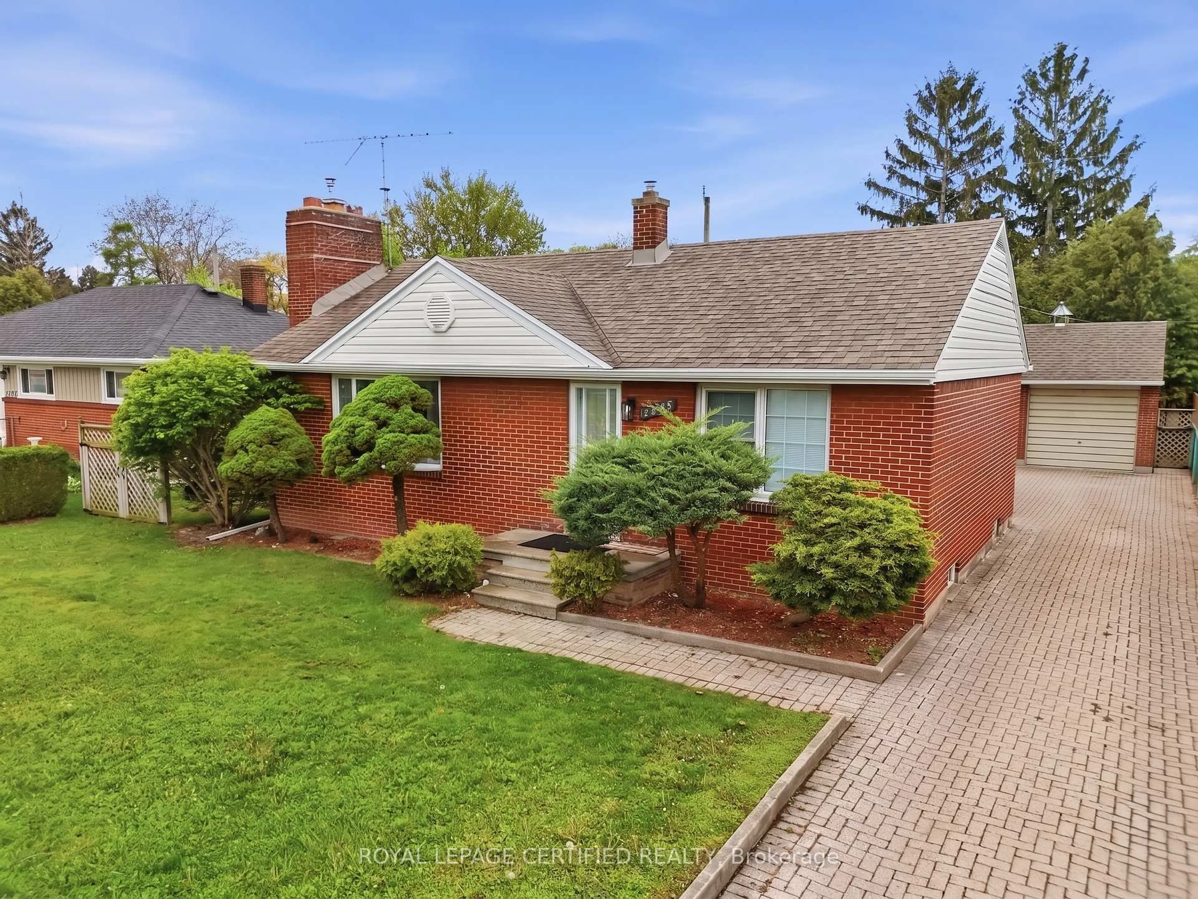 Home with brick exterior material, street for 2485 Dominion Blvd, Windsor Ontario N9E 2M5