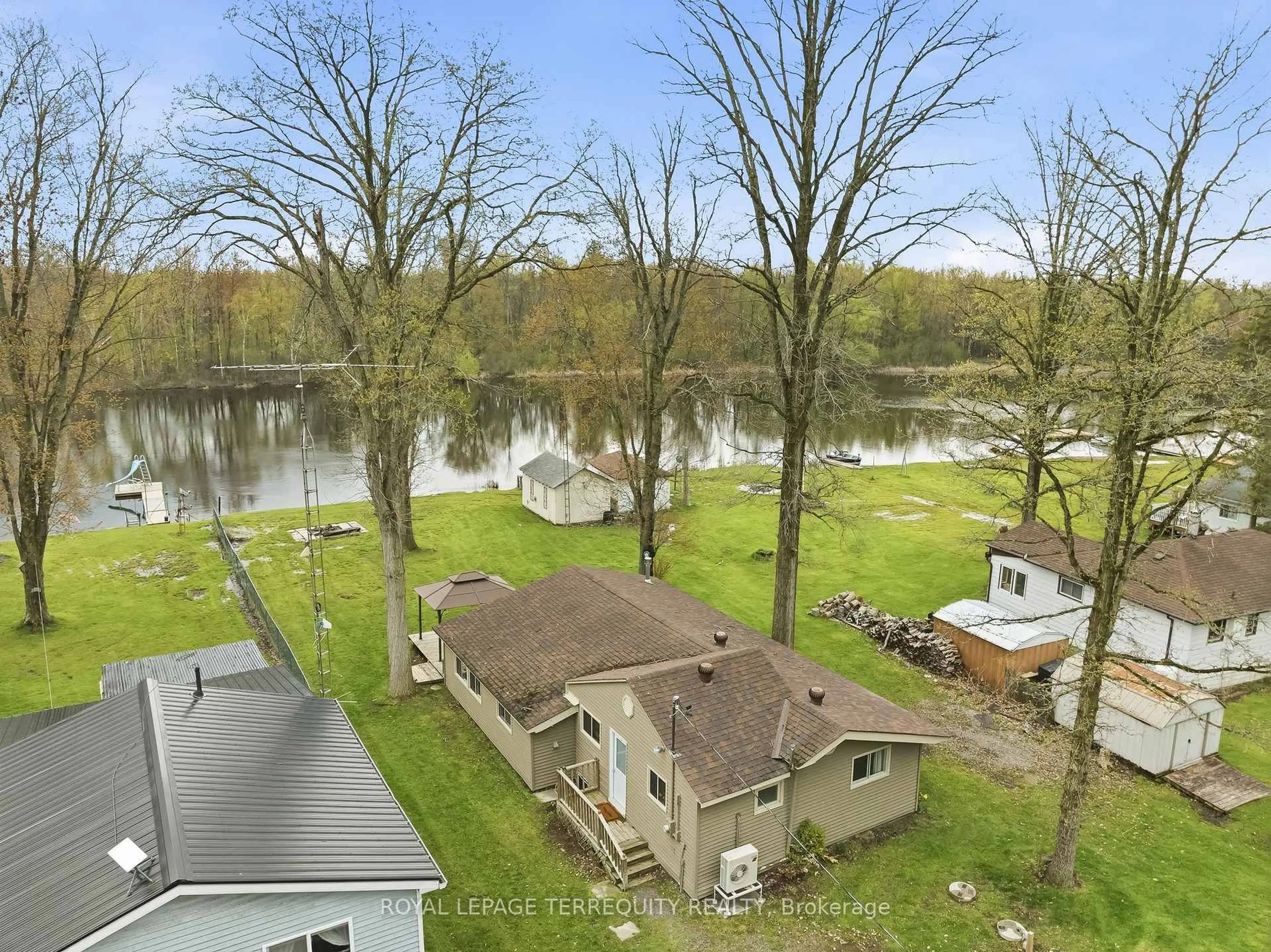 A pic from outside/outdoor area/front of a property/back of a property/a pic from drone, water/lake/river/ocean view for 49 River Rd, Trent Hills Ontario K0L 1L0