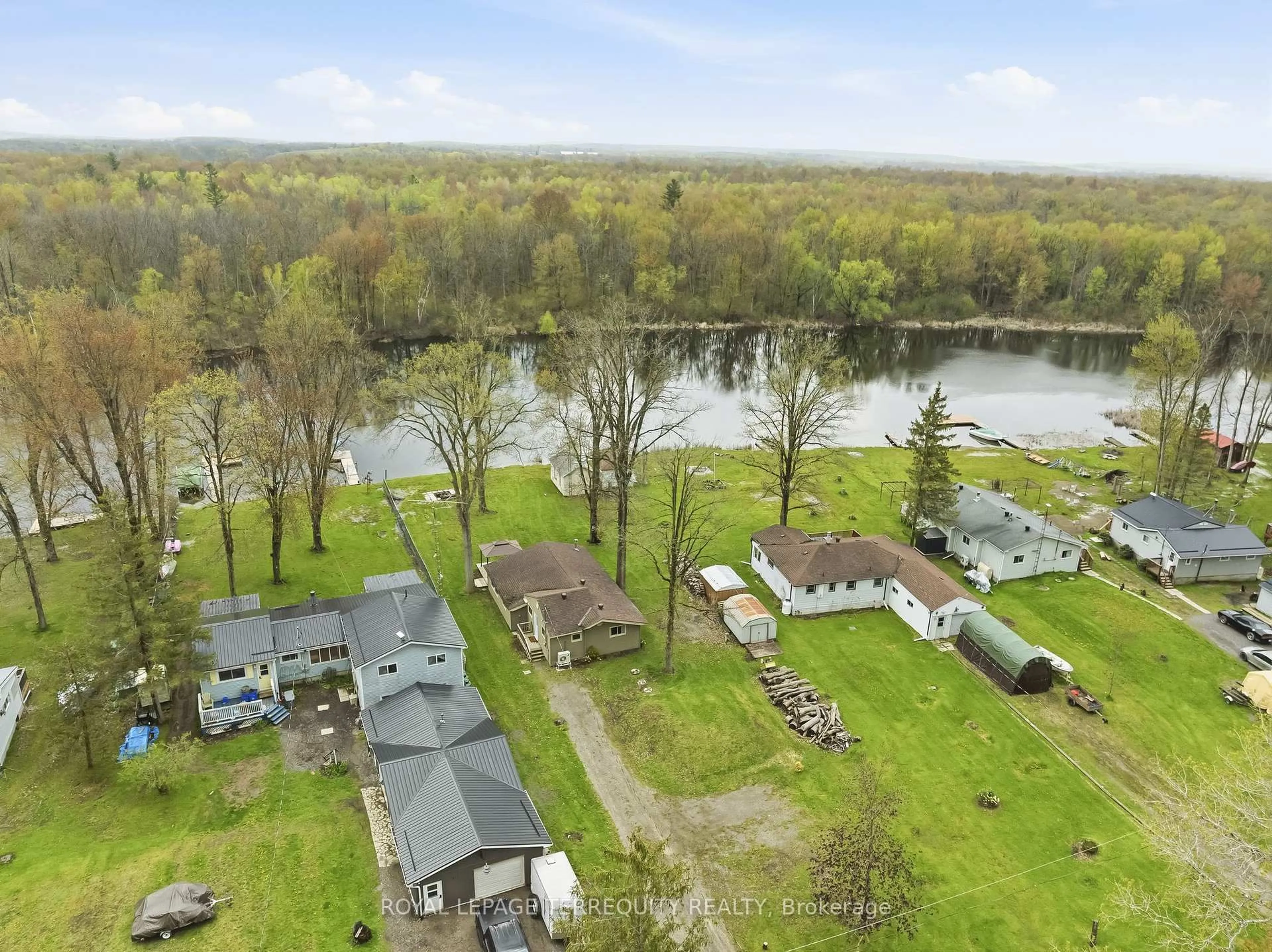 A pic from outside/outdoor area/front of a property/back of a property/a pic from drone, water/lake/river/ocean view for 49 River Rd, Trent Hills Ontario K0L 1L0