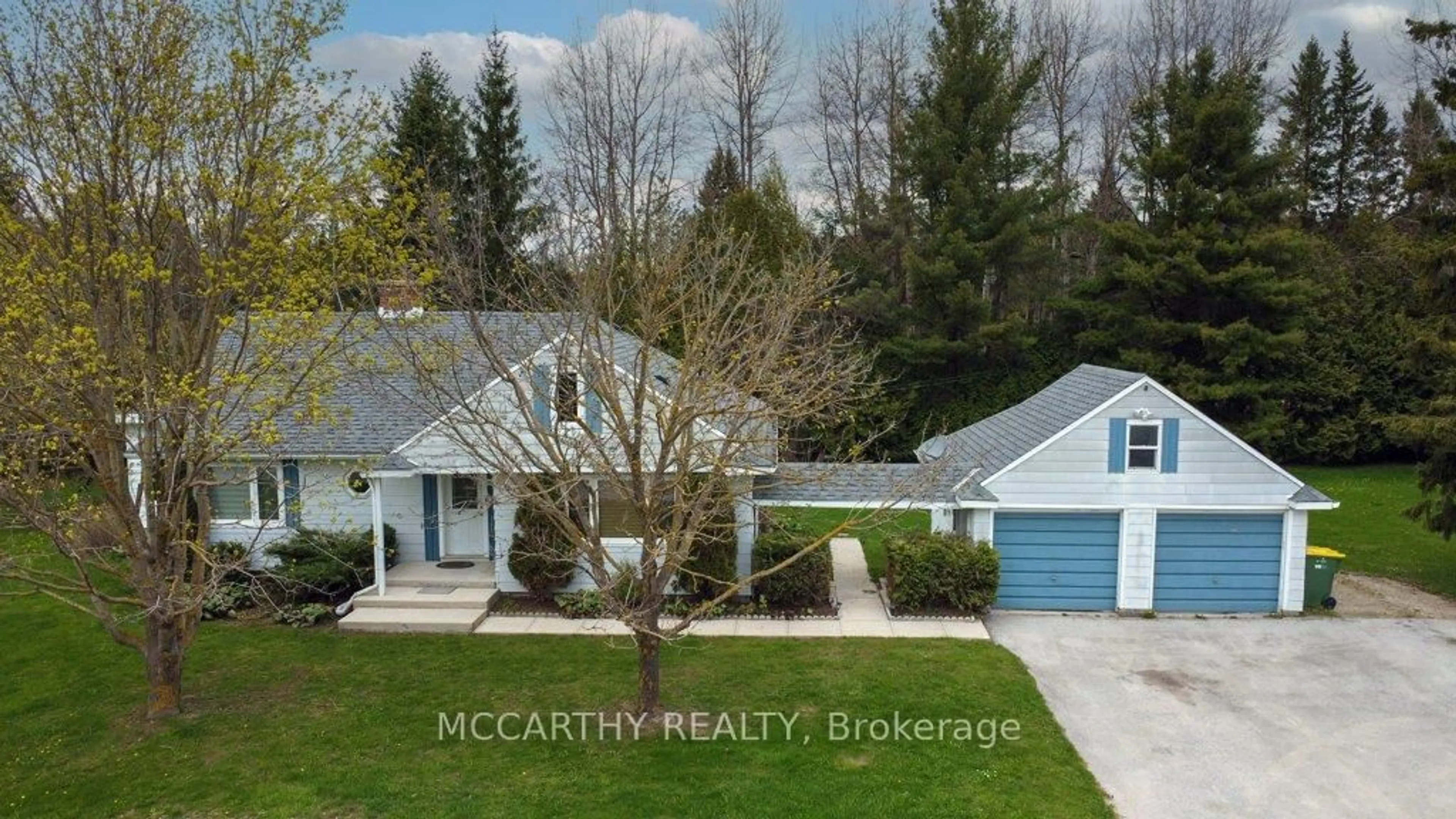 A pic from outside/outdoor area/front of a property/back of a property/a pic from drone, mountain view for 407113 Grey Rd 4 Rd, Grey Highlands Ontario N0C 1E0