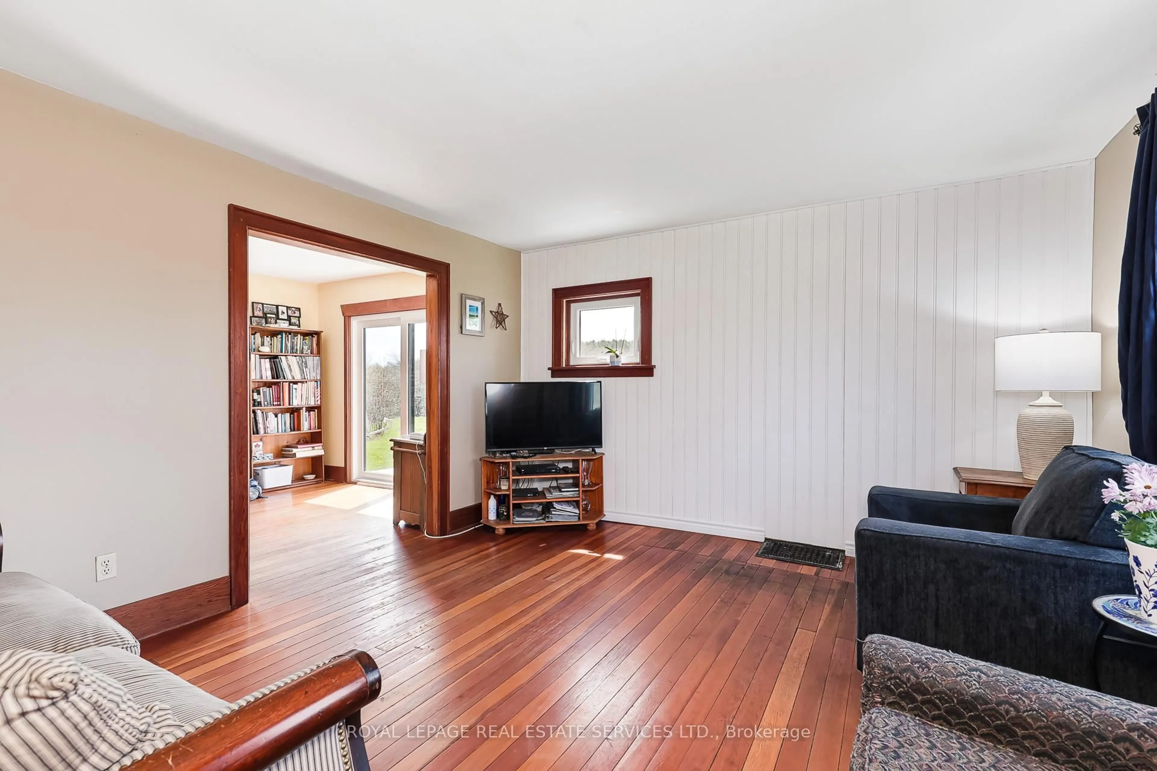 Living room with furniture, wood/laminate floor for 58111 12th Line, Meaford Ontario N4L 1W5