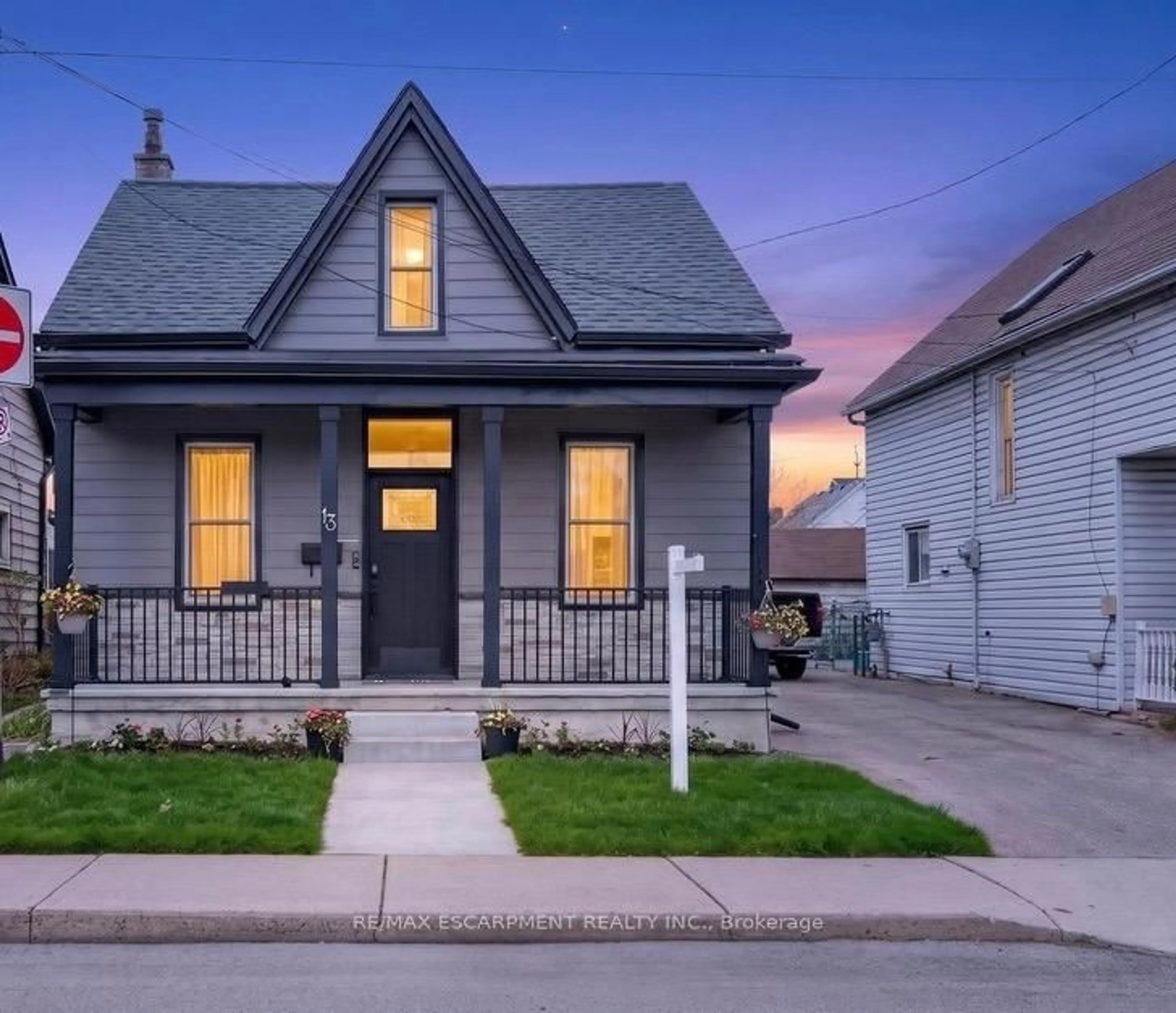 Home with vinyl exterior material, street for 13 Richmond St, Hamilton Ontario L8P 4J3
