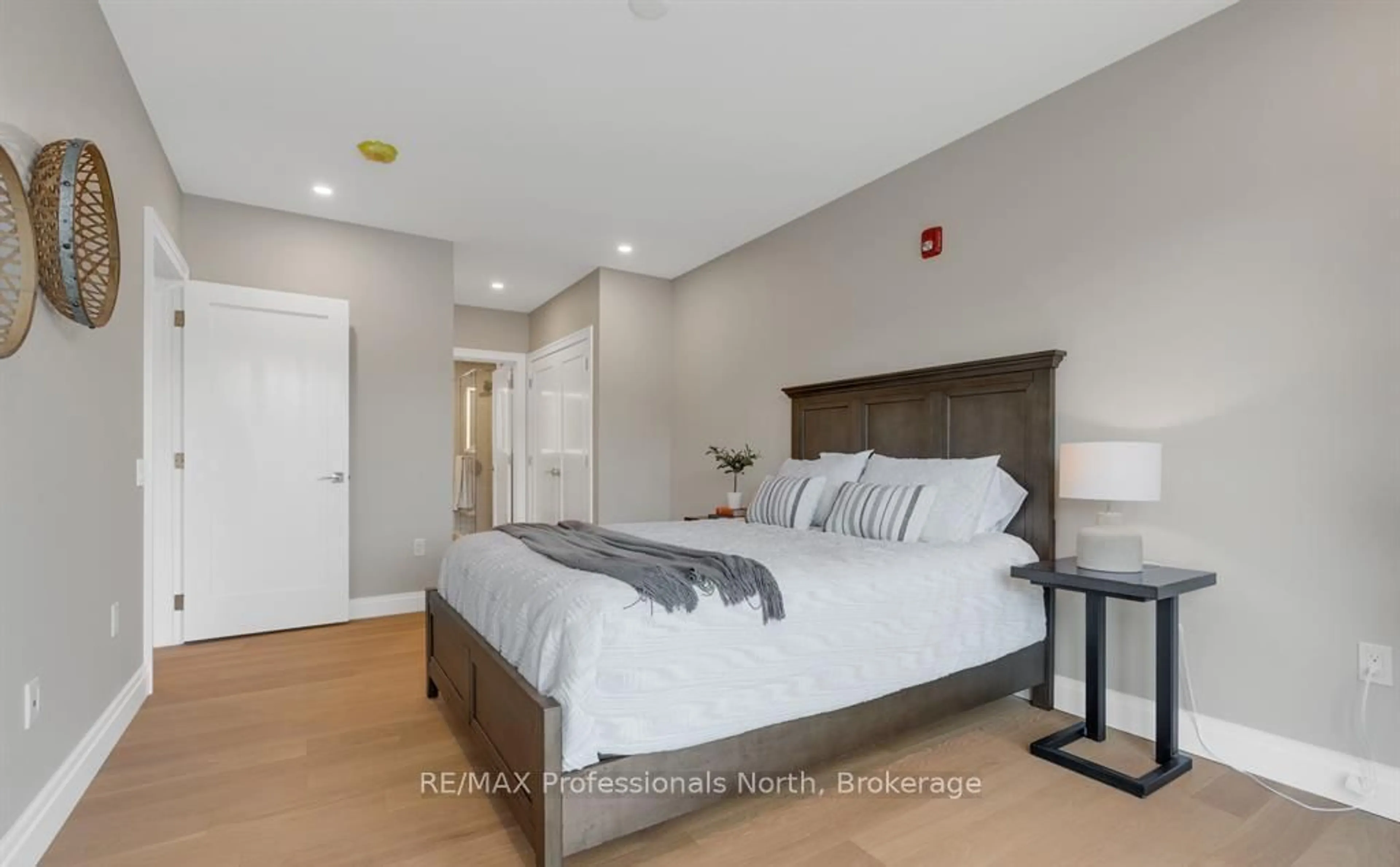 Bedroom with bed, unknown for 32 Brunel Rd #105, Huntsville Ontario P1H 1P5