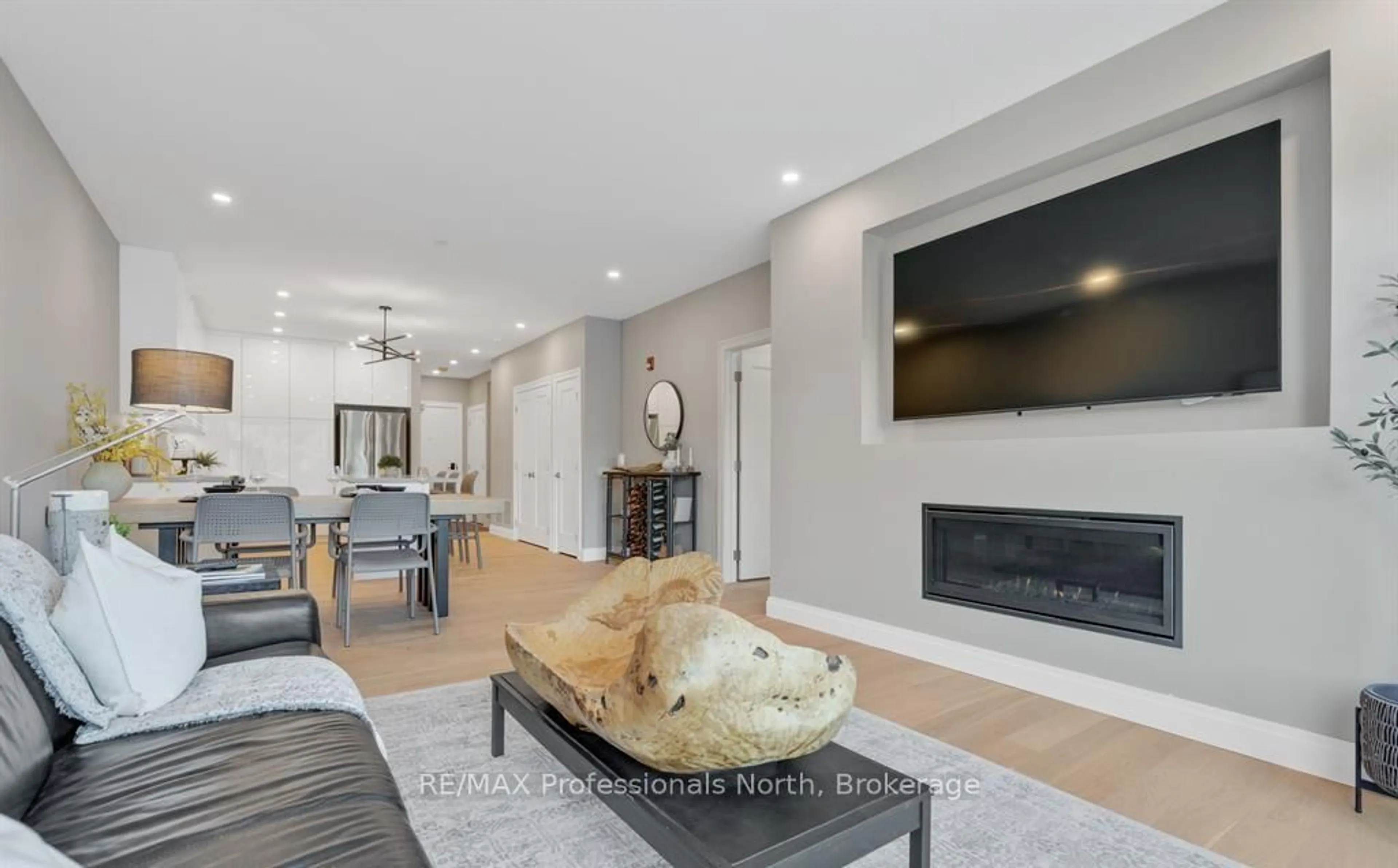 Living room with furniture, unknown for 32 Brunel Rd #201, Huntsville Ontario P1H 1P5
