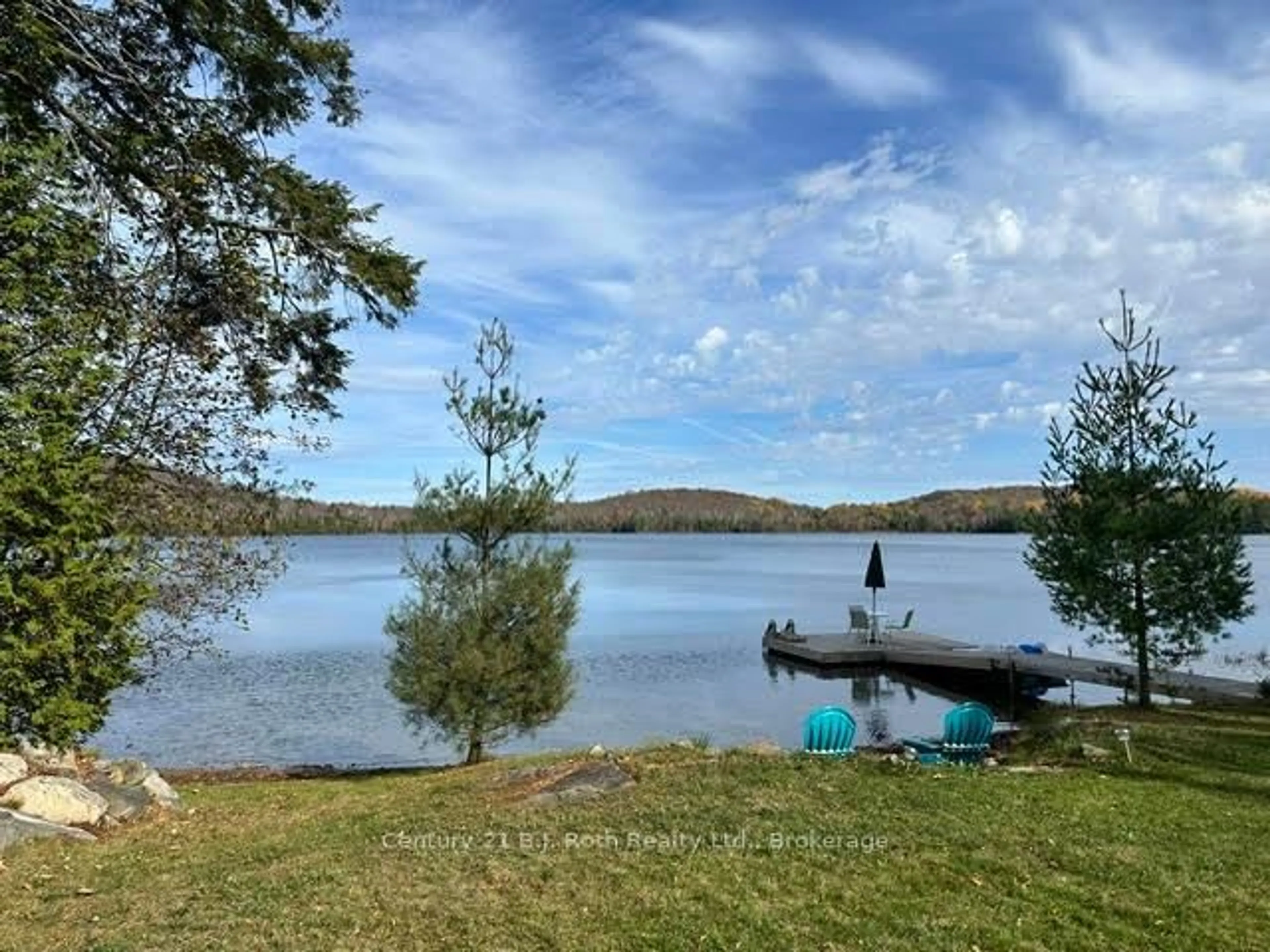 A pic from outside/outdoor area/front of a property/back of a property/a pic from drone, water/lake/river/ocean view for 1337 Hudson Lake Dr, Highlands East Ontario K0L 2A0