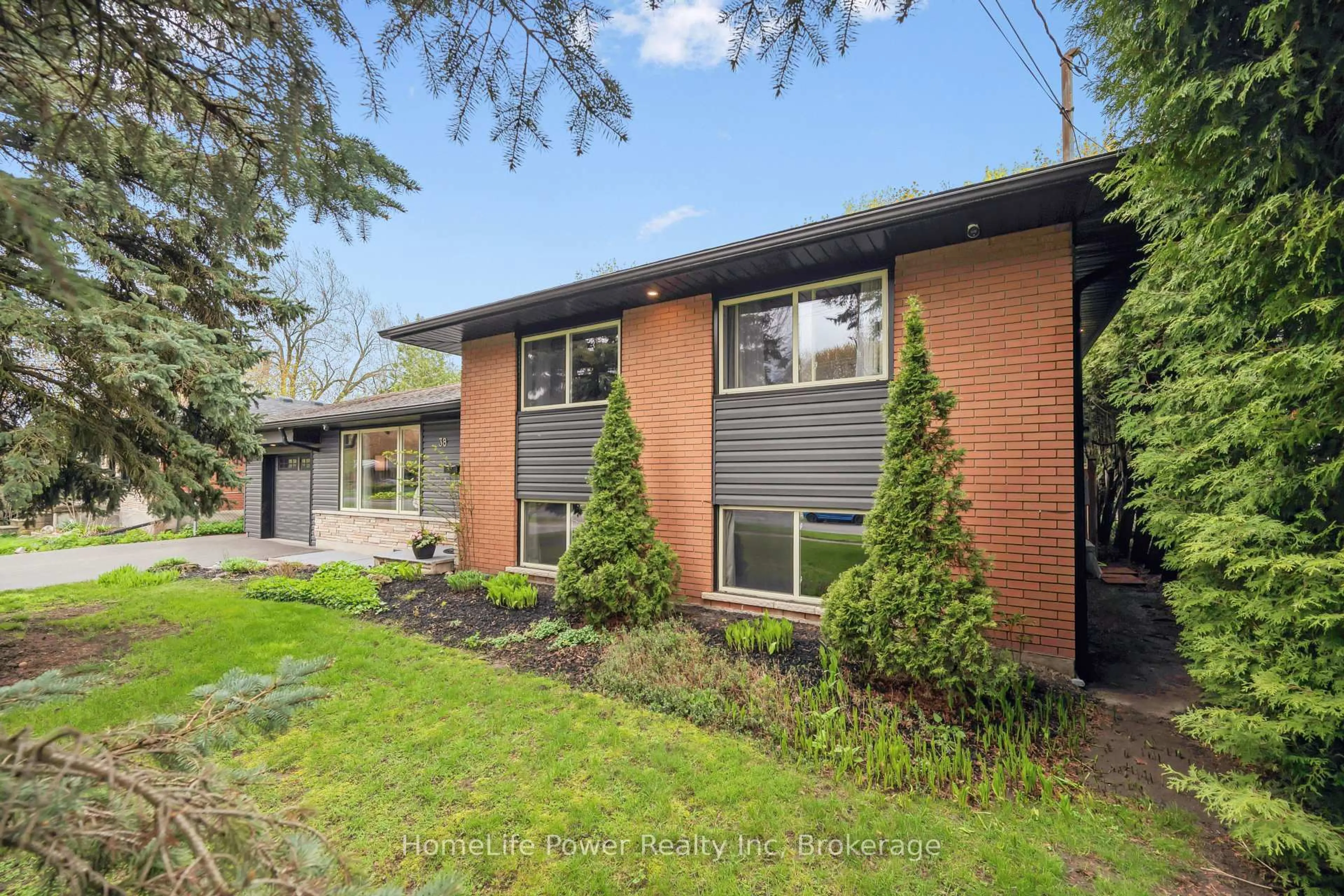 Home with brick exterior material, street for 38 Balmoral Dr, Guelph Ontario N1E 3N6
