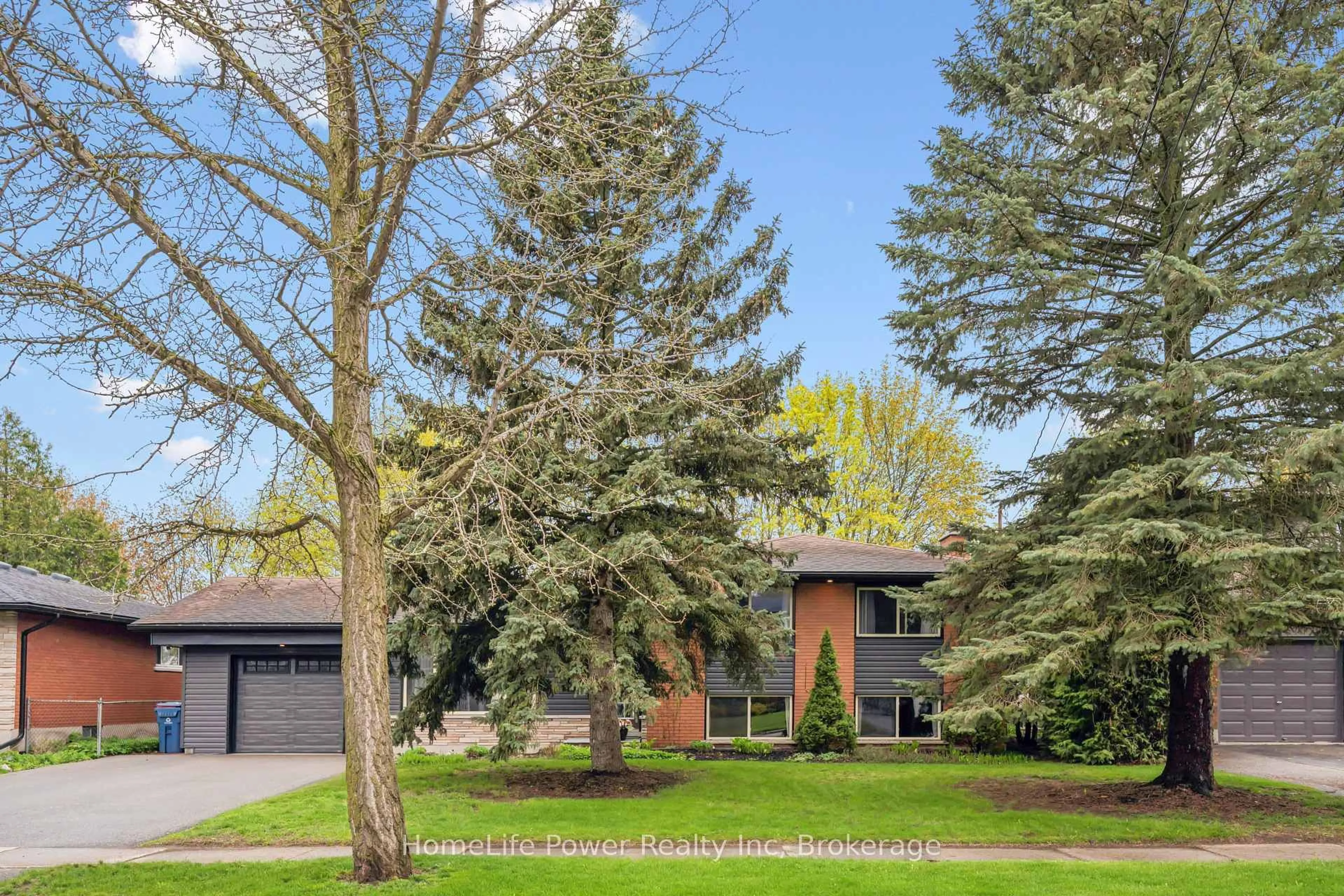 Home with brick exterior material, street for 38 Balmoral Dr, Guelph Ontario N1E 3N6