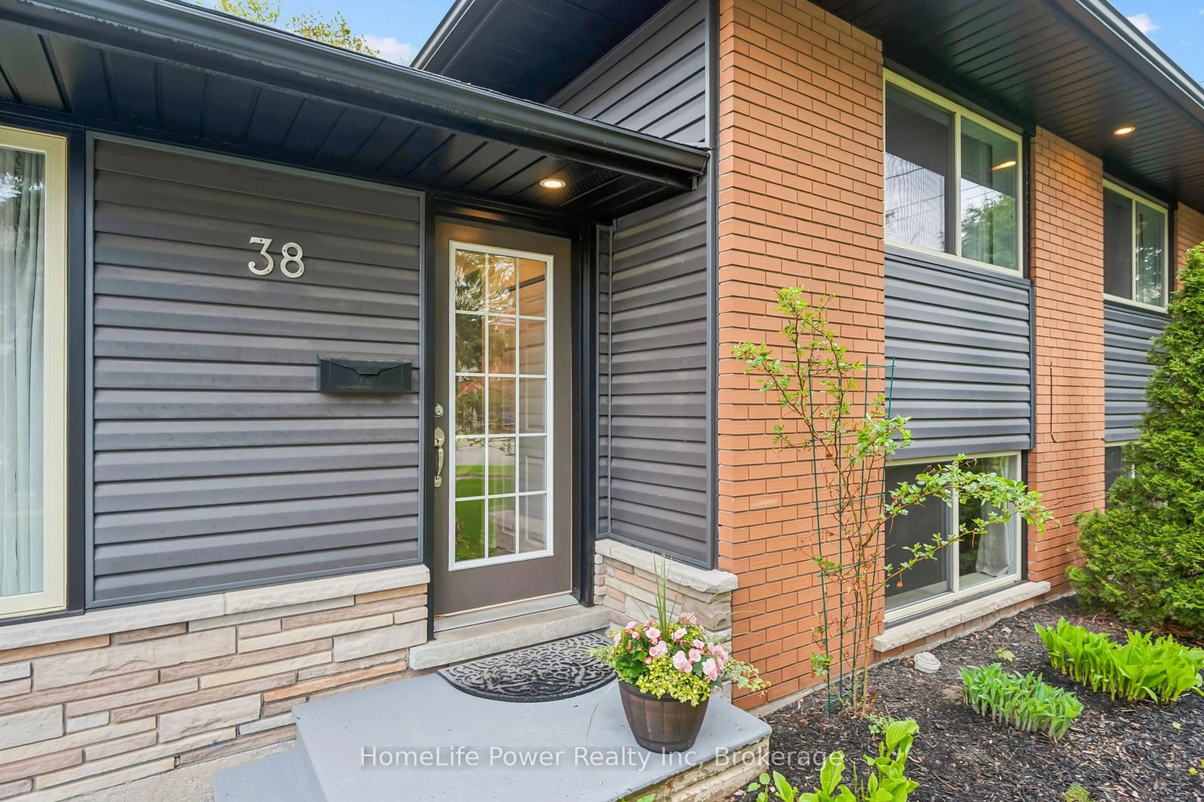 Home with brick exterior material, street for 38 Balmoral Dr, Guelph Ontario N1E 3N6