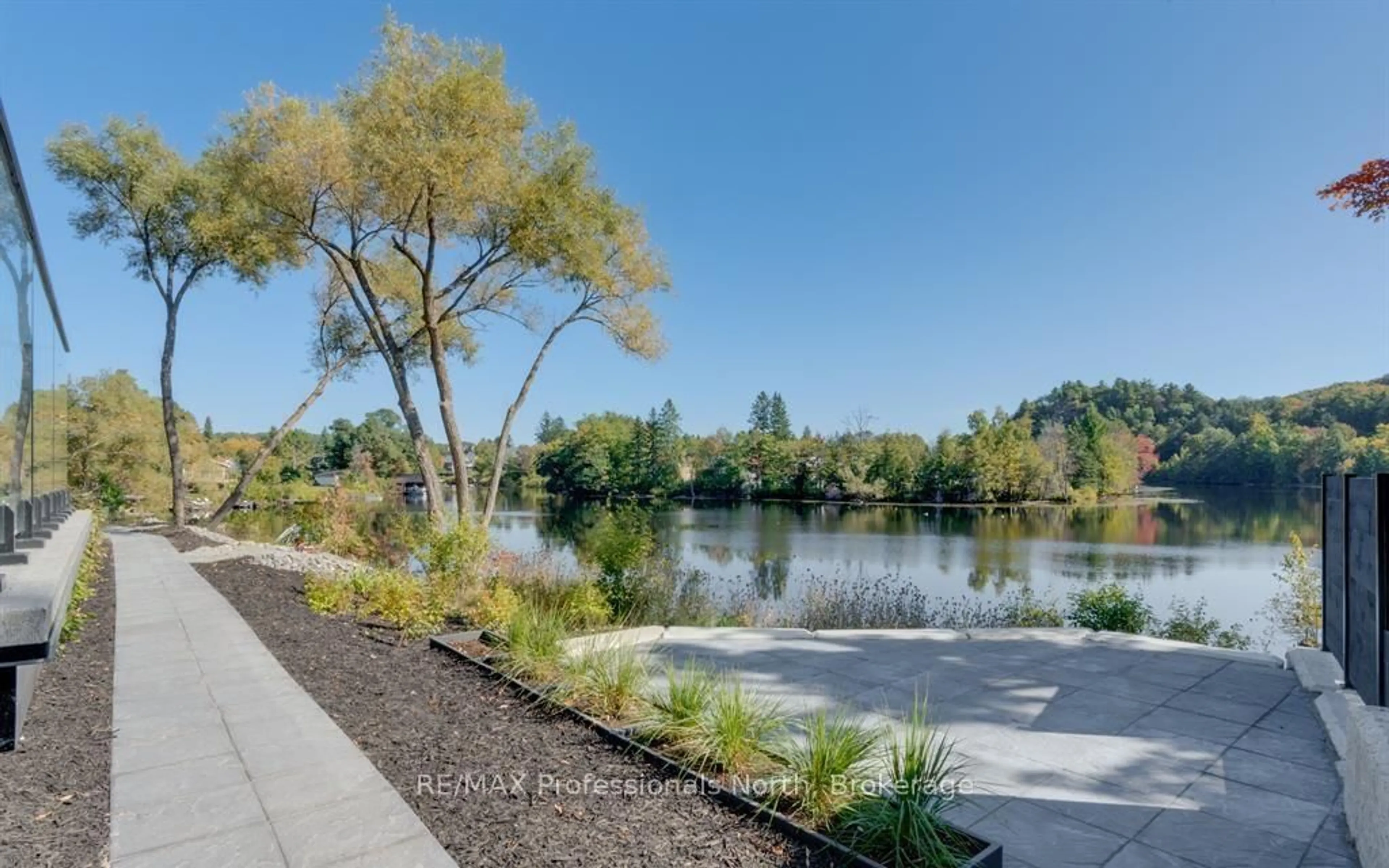Patio, water/lake/river/ocean view for 32 Brunel Rd #102, Huntsville Ontario P1H 1P5