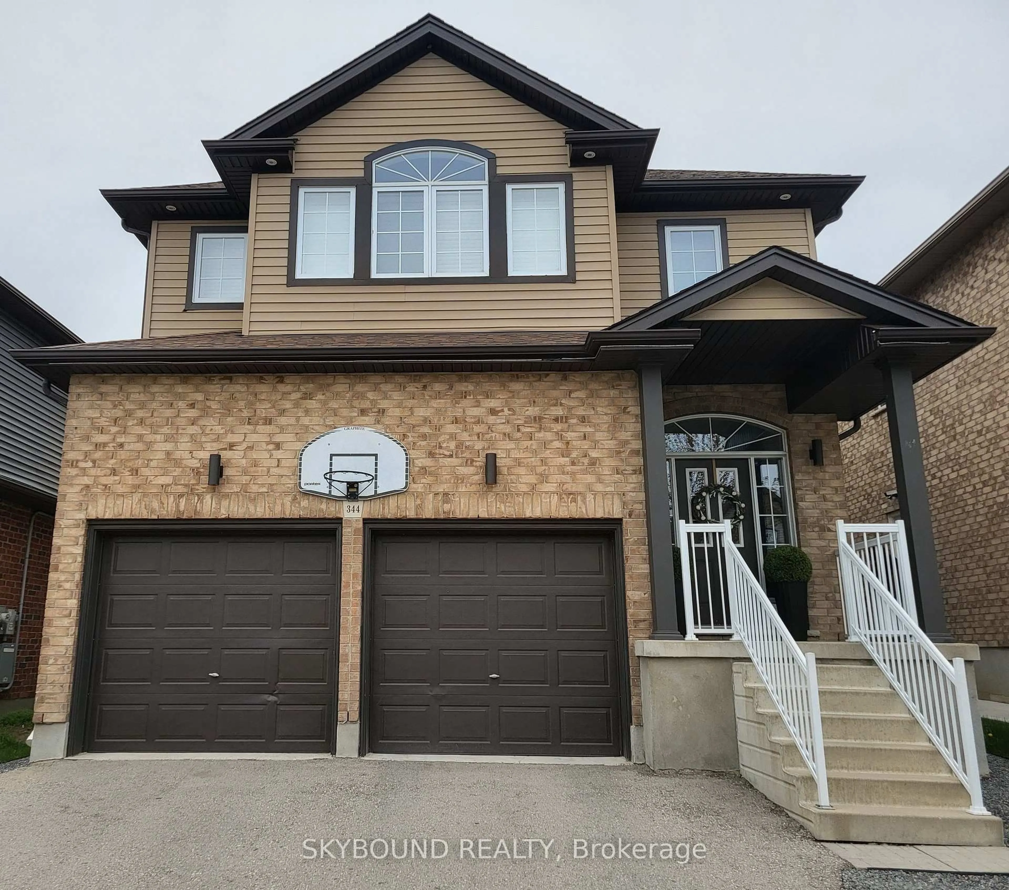 Home with brick exterior material, street for 344 Watervale Cres, Kitchener Ontario N2A 0G1