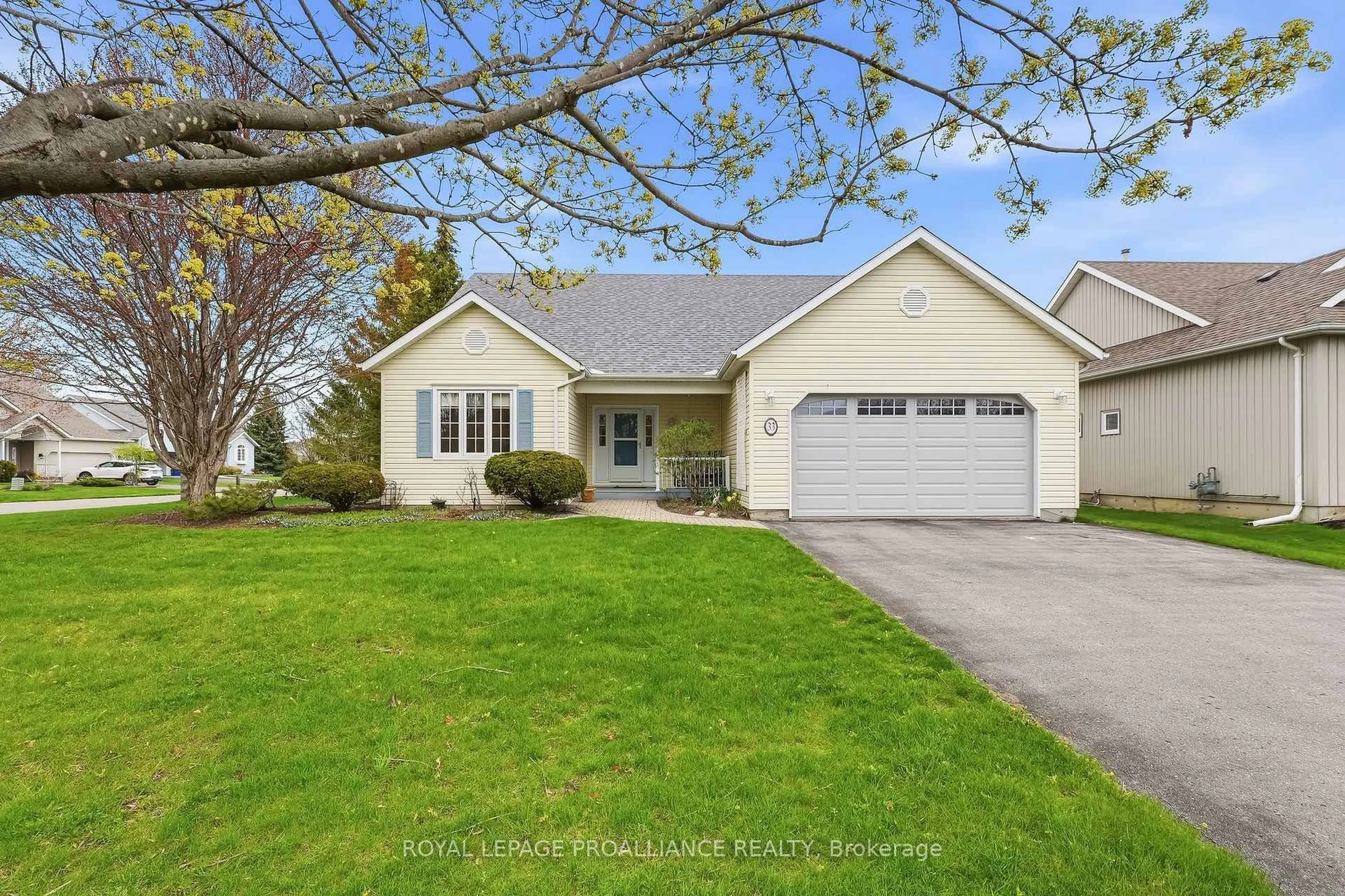 Home with vinyl exterior material, street for 33 Lockwood Dr, Brighton Ontario K0K 1H0